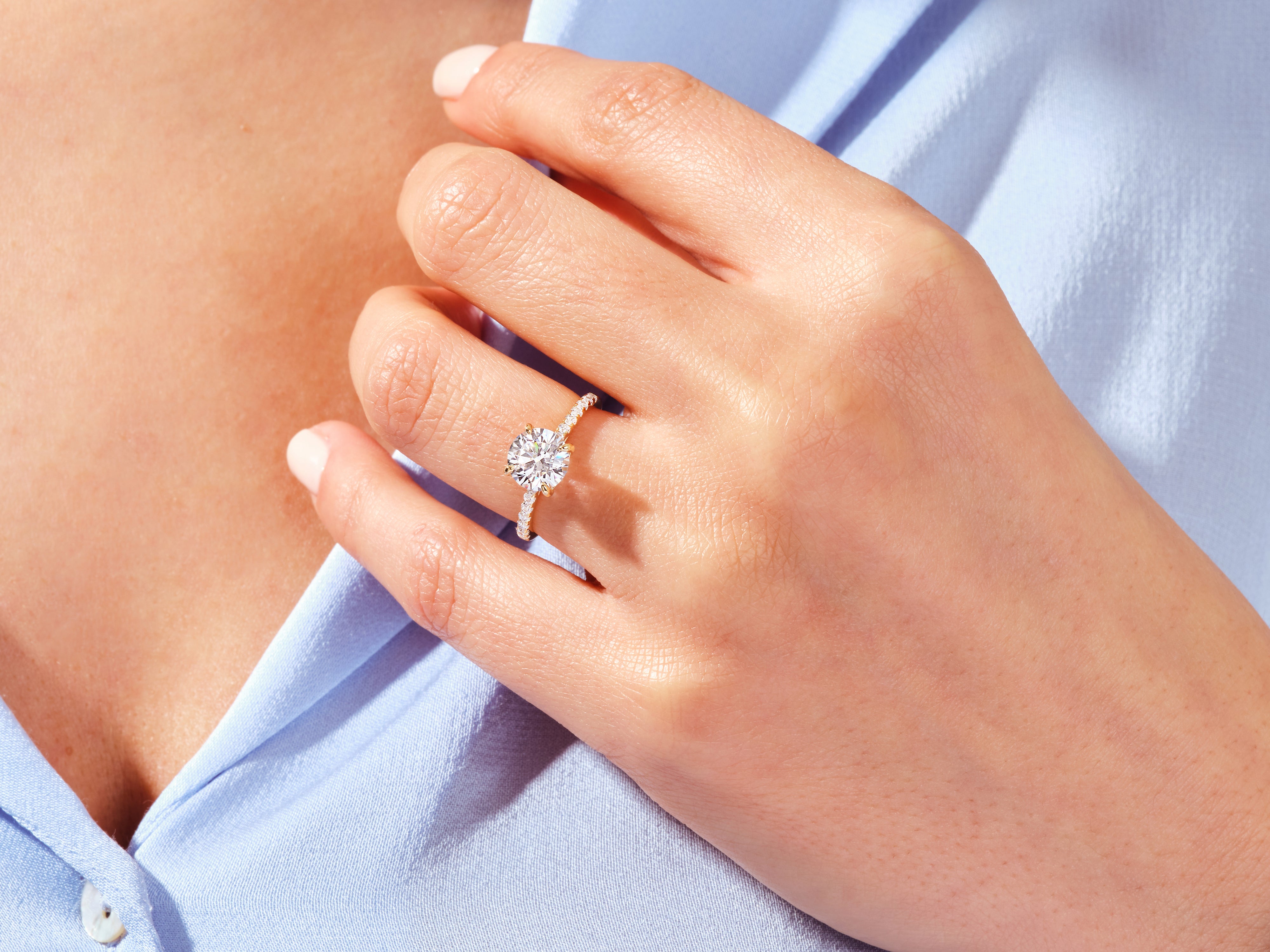 Round Cut Engagement Ring with Pave Set Side Stones