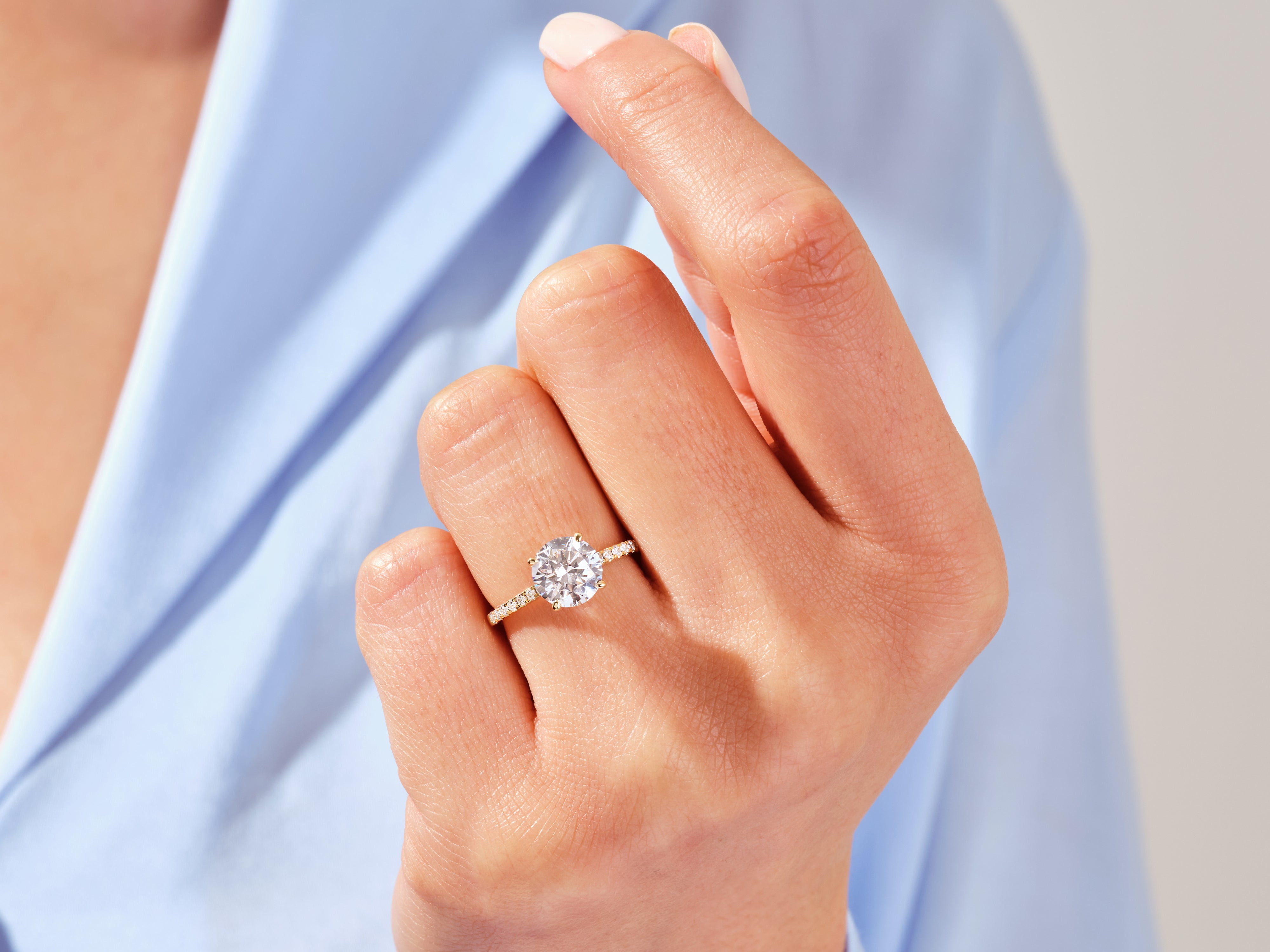 Round Cut Engagement Ring with Pave Set Side Stones