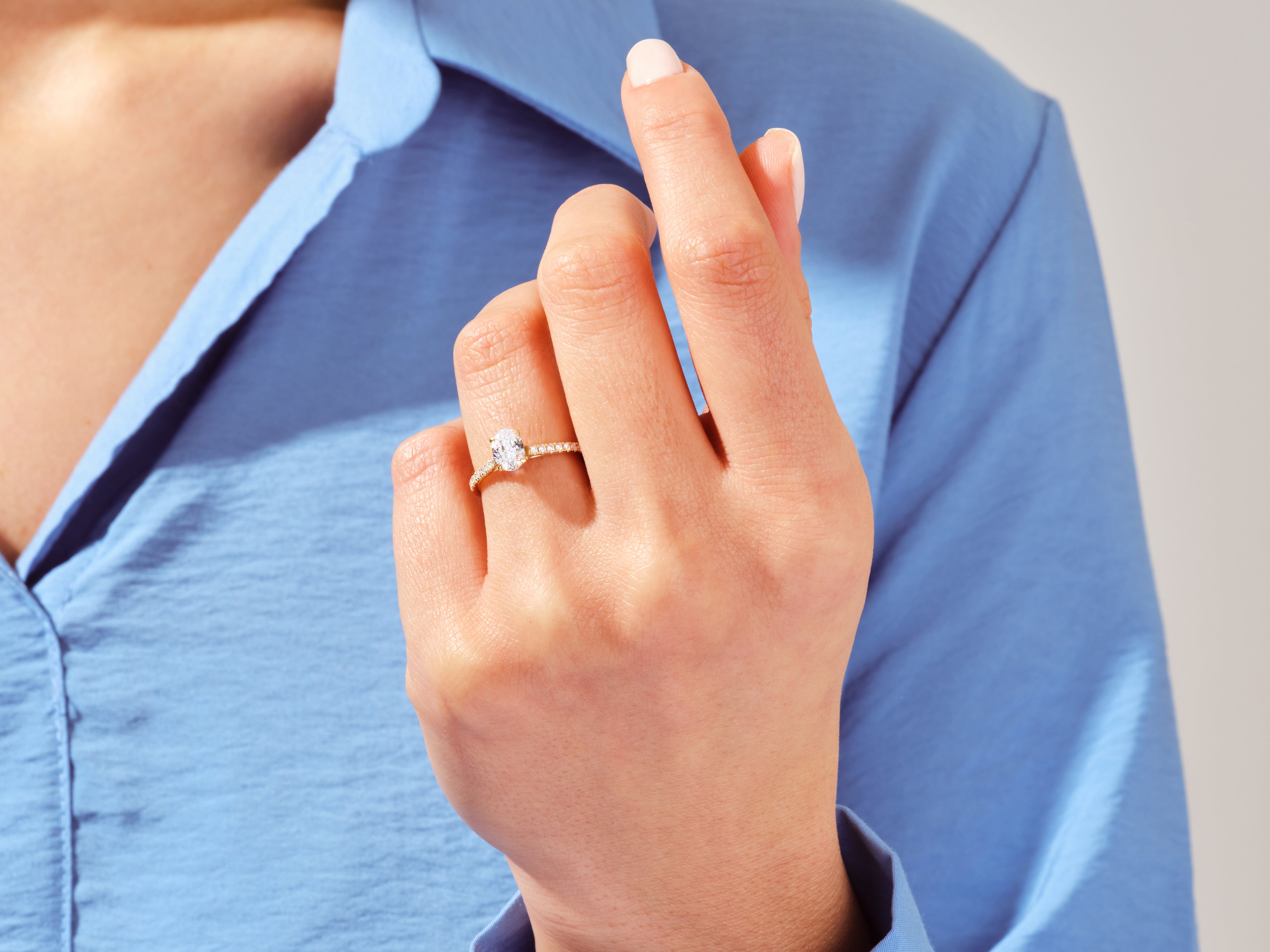 Oval Cut Engagement Ring with Pave Set Side Stones