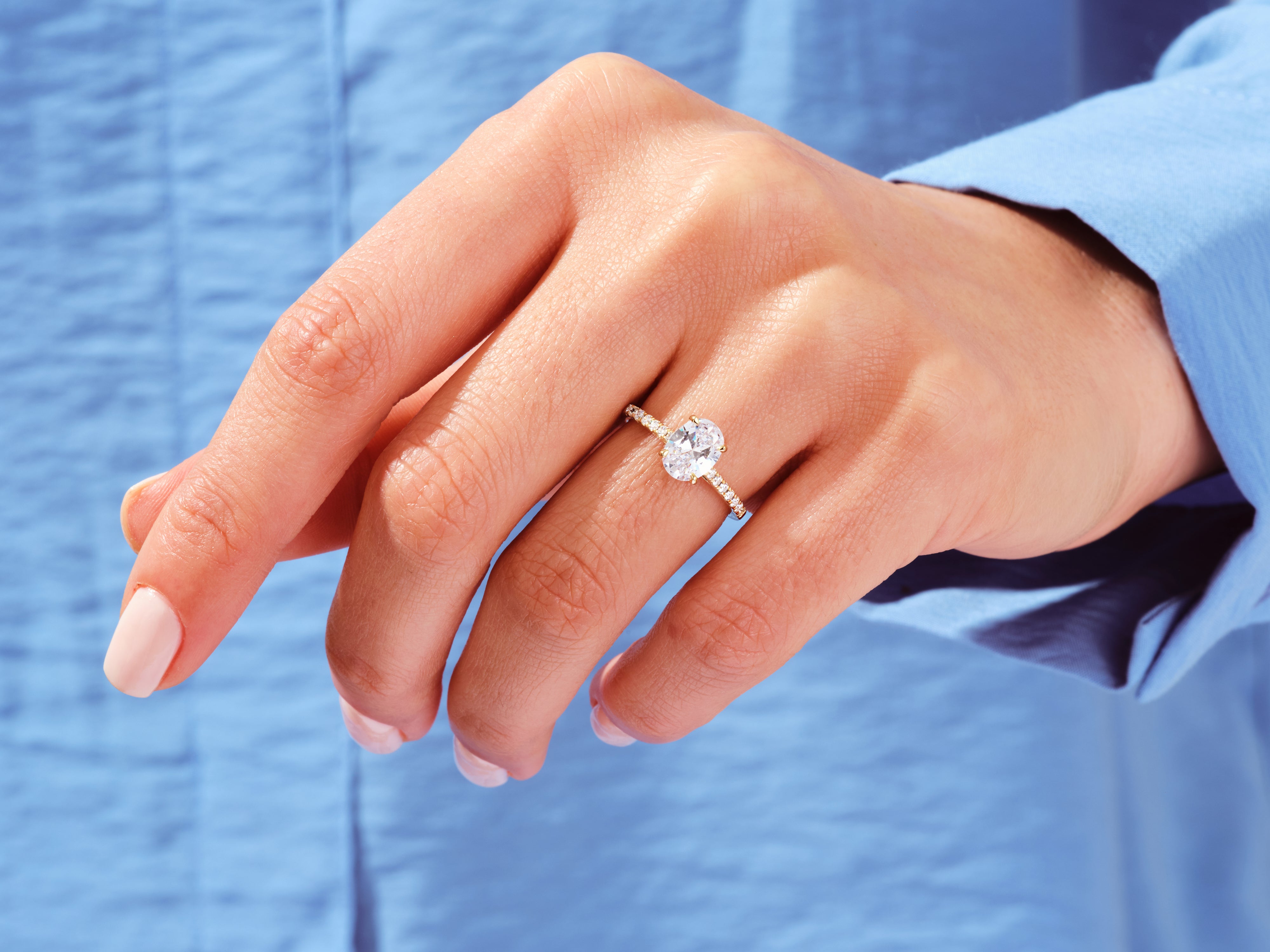 Oval Cut Engagement Ring with Pave Set Side Stones