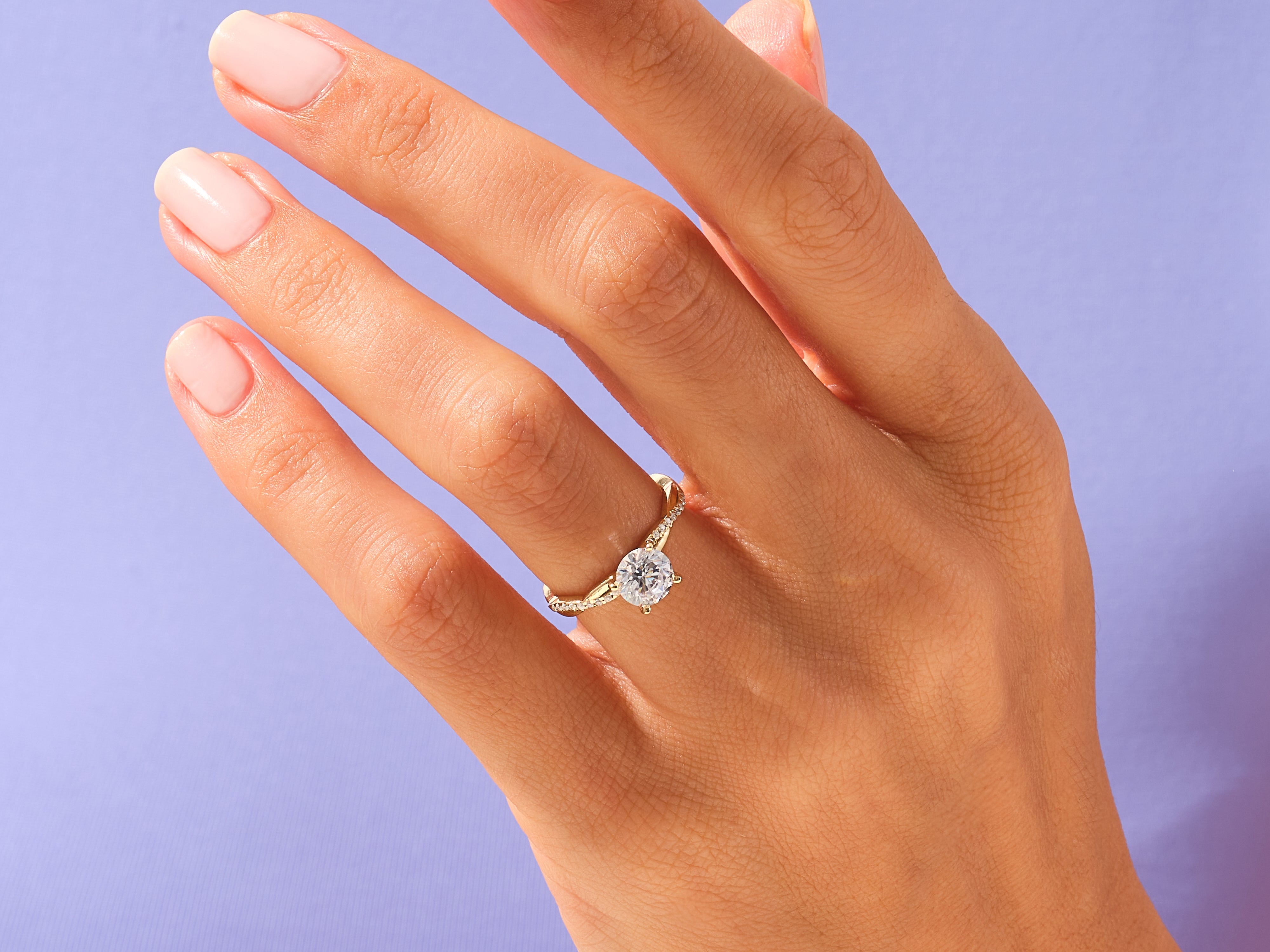 Round Twisted Engagement Ring