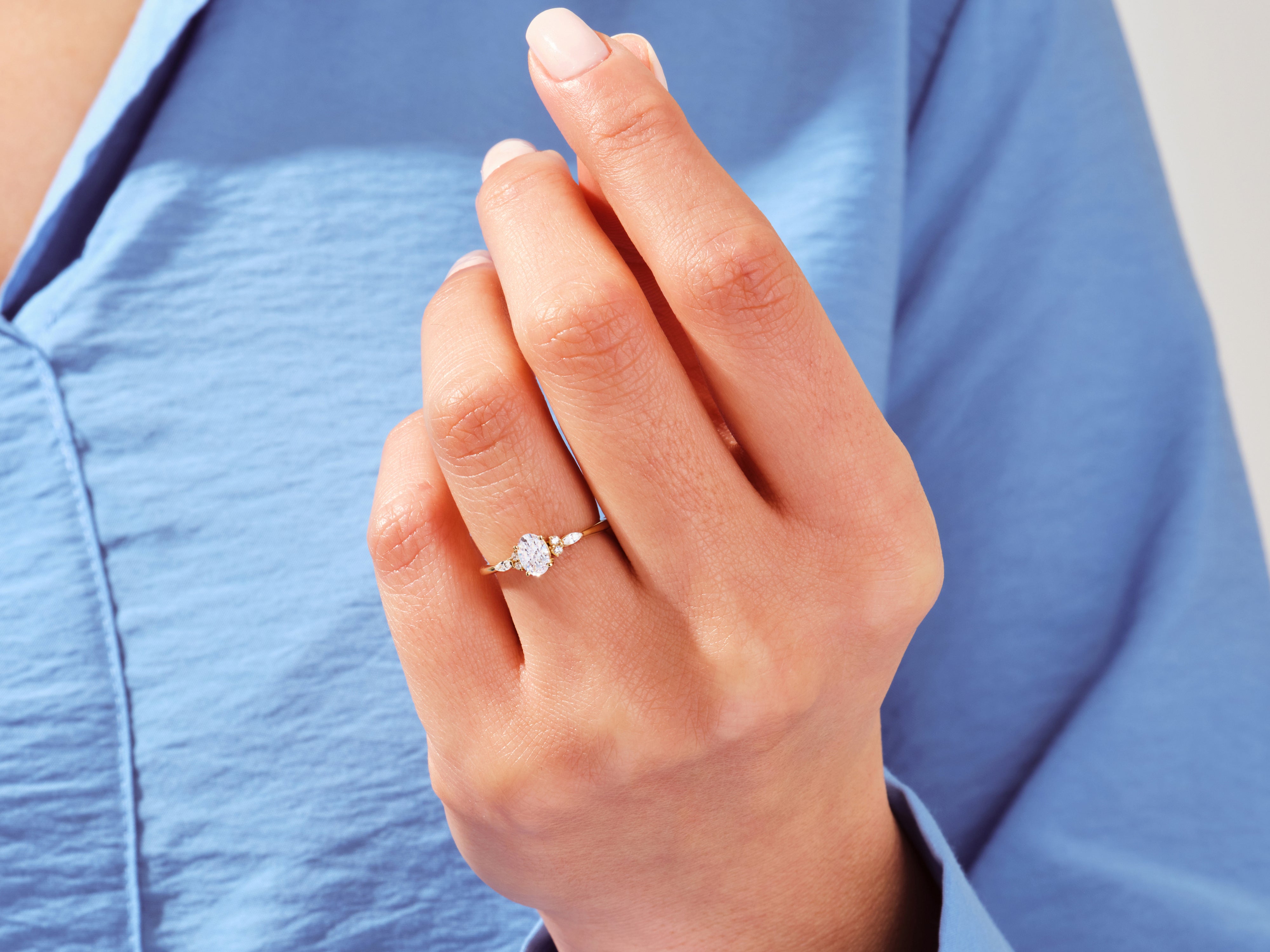 Cluster Accent Oval Cut Engagement Ring
