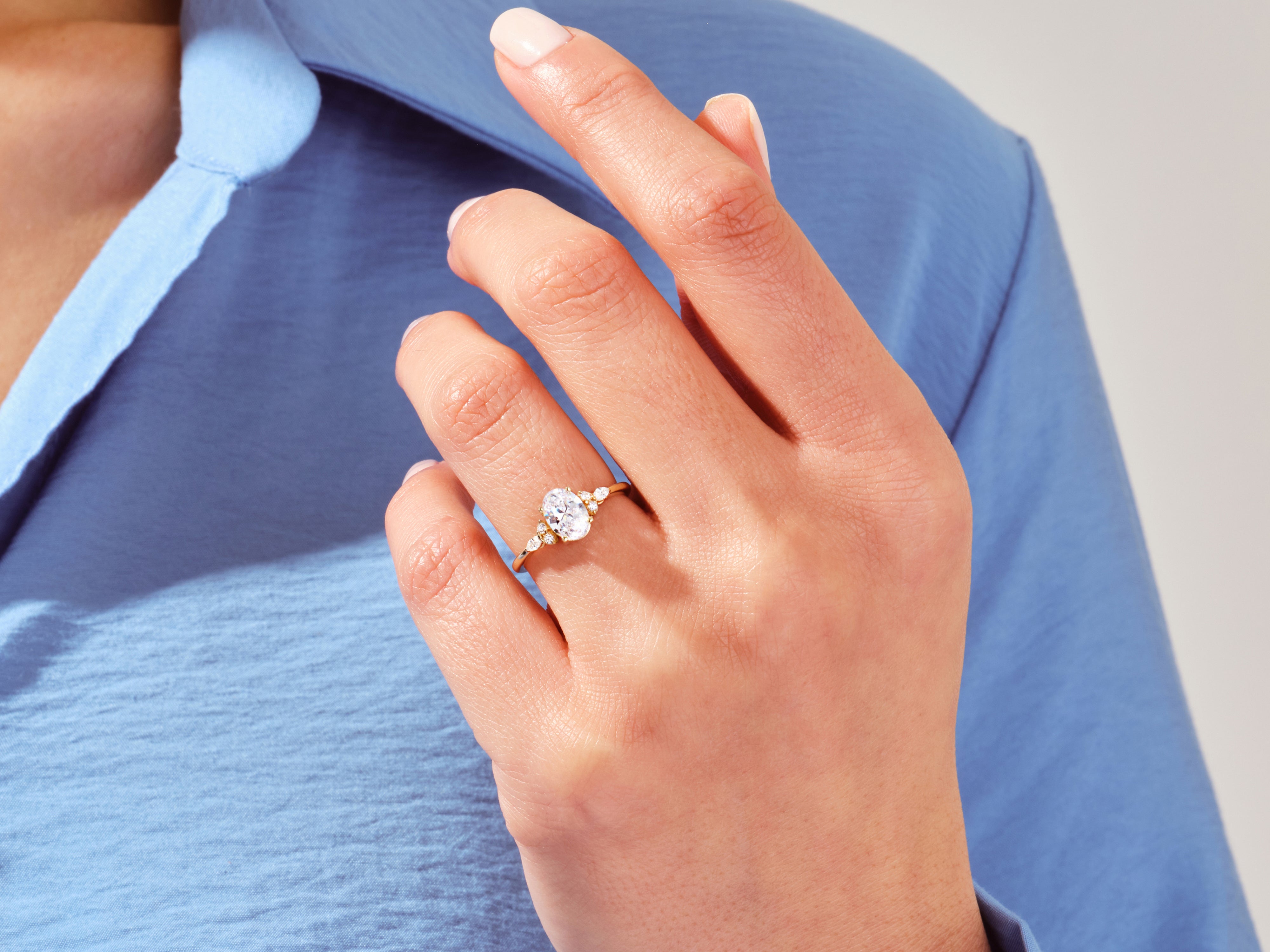 Cluster Accent Oval Cut Engagement Ring