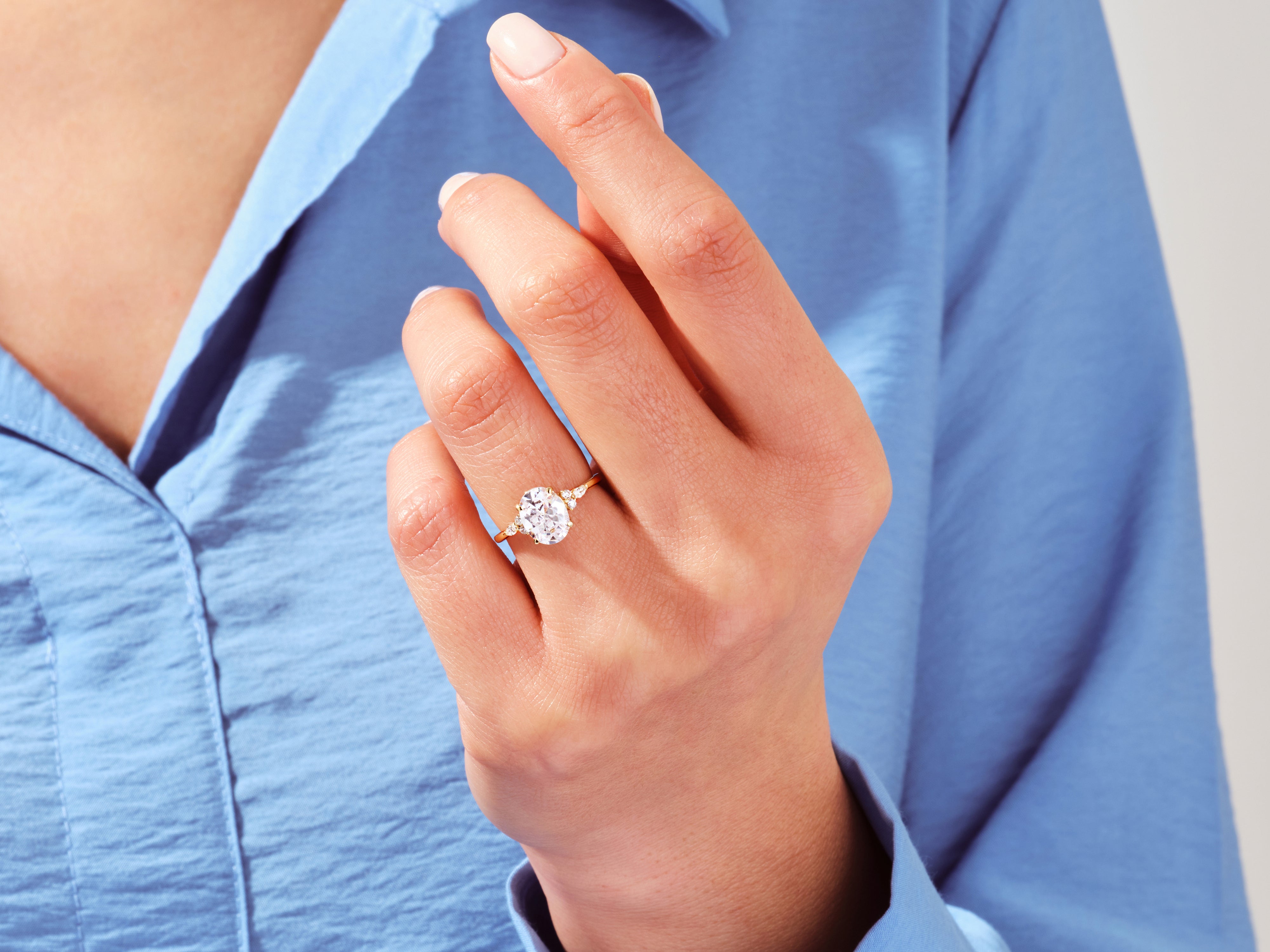 Cluster Accent Oval Cut Engagement Ring