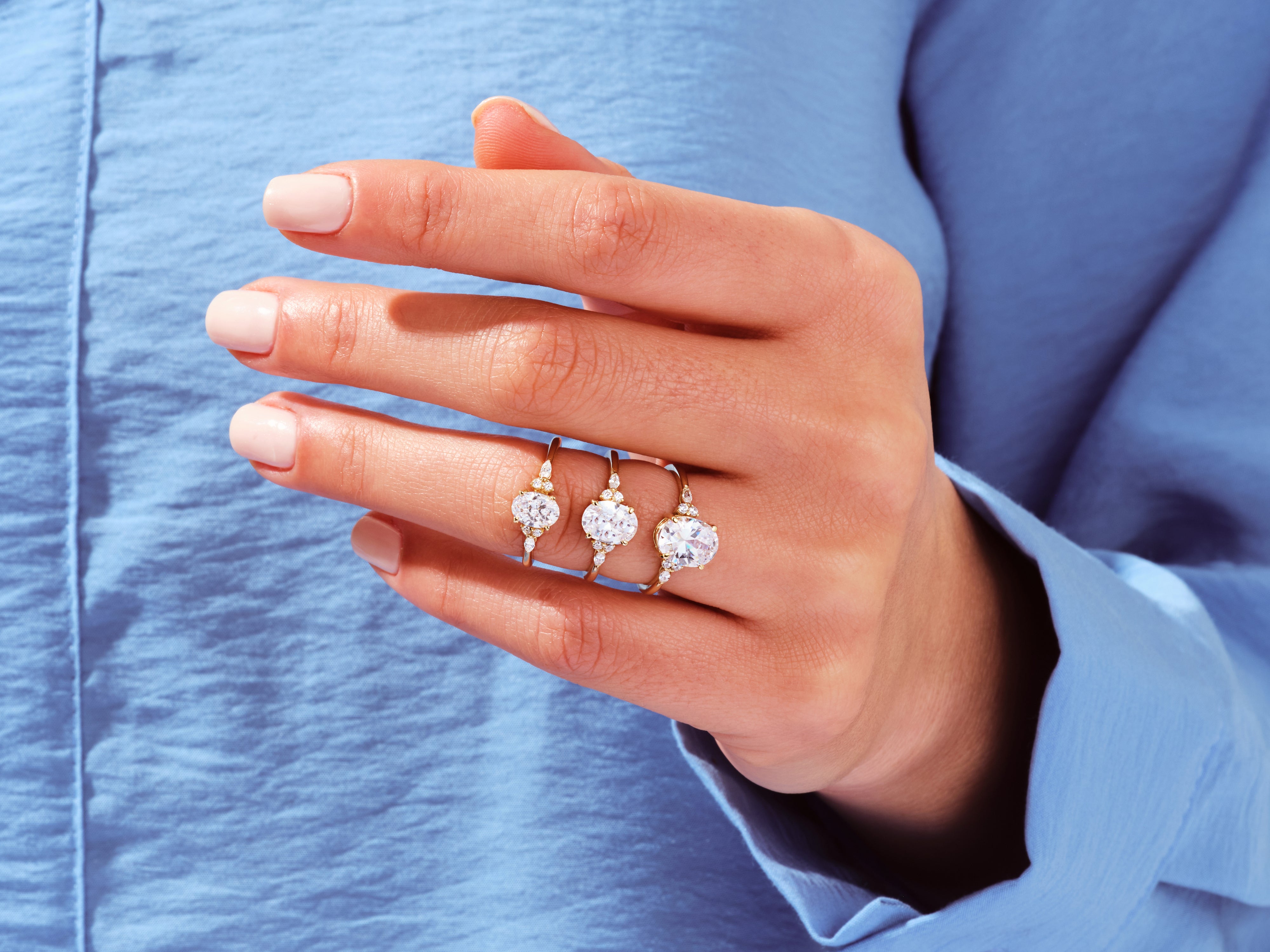 Cluster Accent Oval Cut Engagement Ring