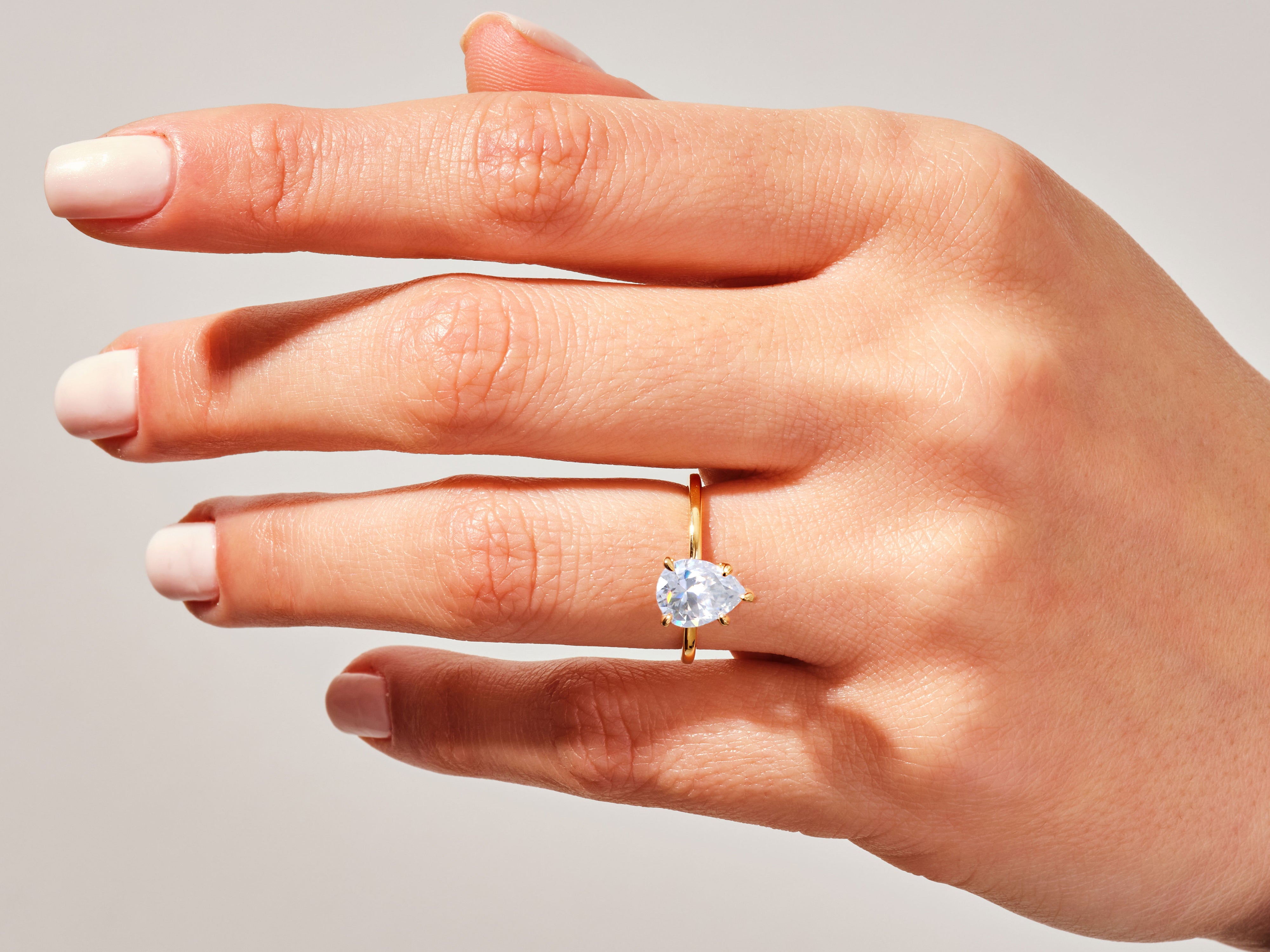 Pear Solitaire Engagement Ring