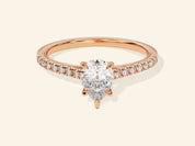 Pear Cut Engagement Ring with Pave Set Side Stones