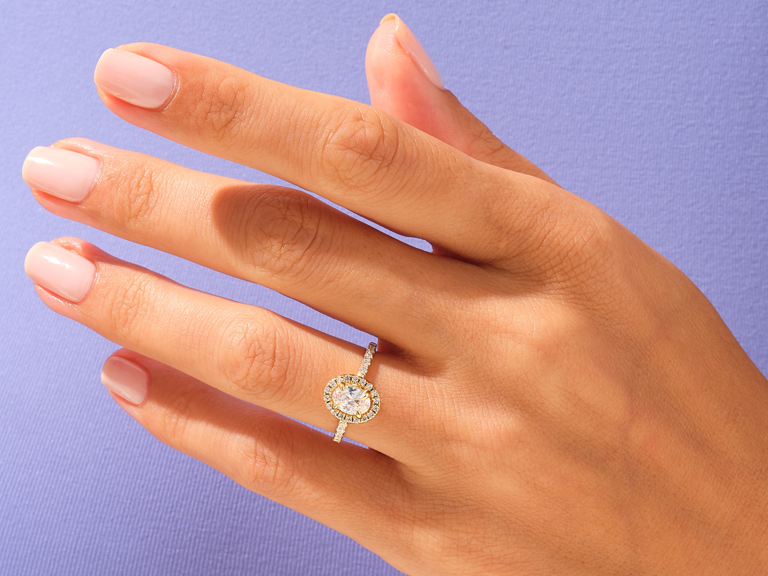 Oval Halo Engagement Ring with Pave Set Side Stones
