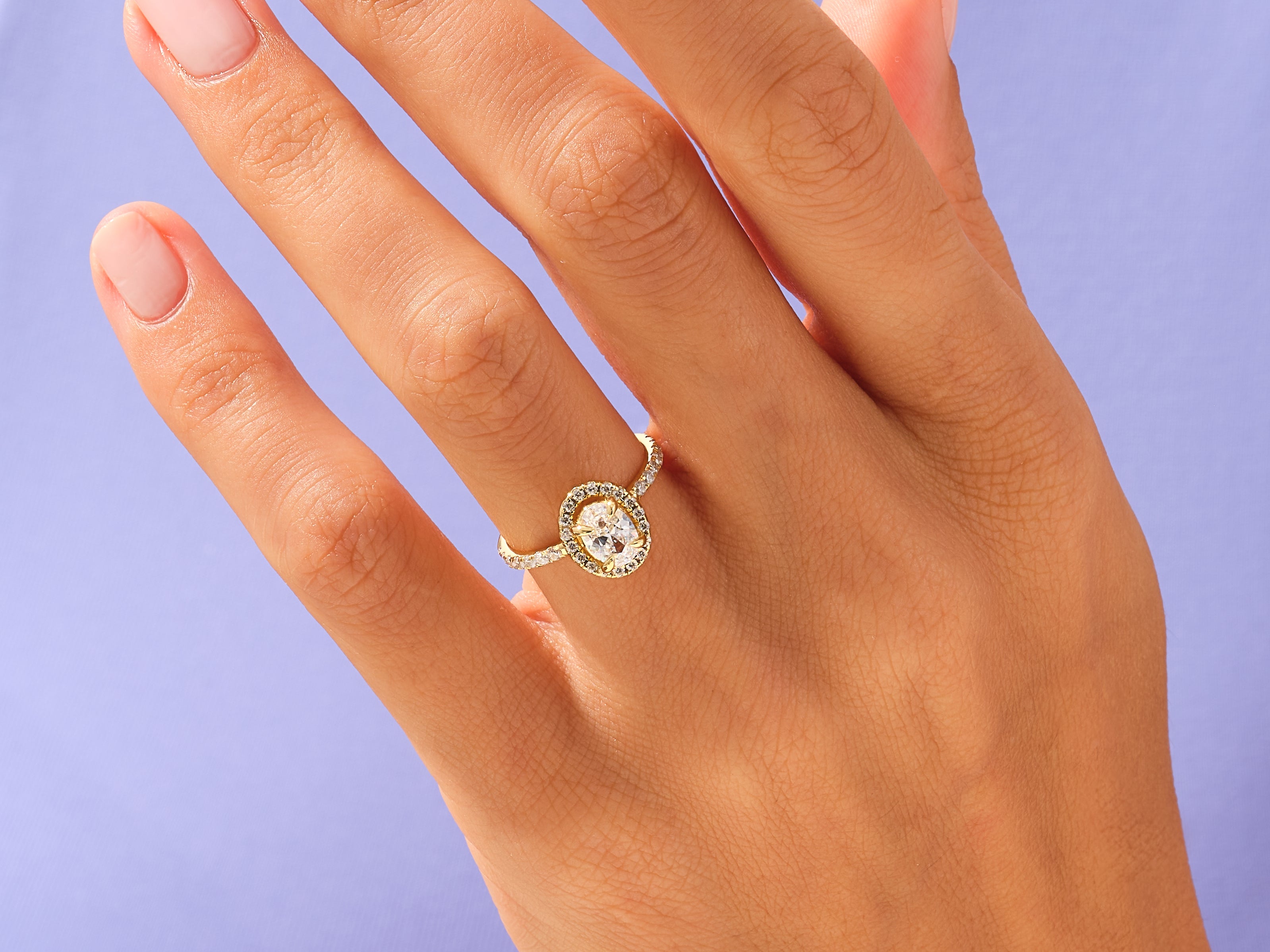 Oval Halo Engagement Ring with Pave Set Side Stones