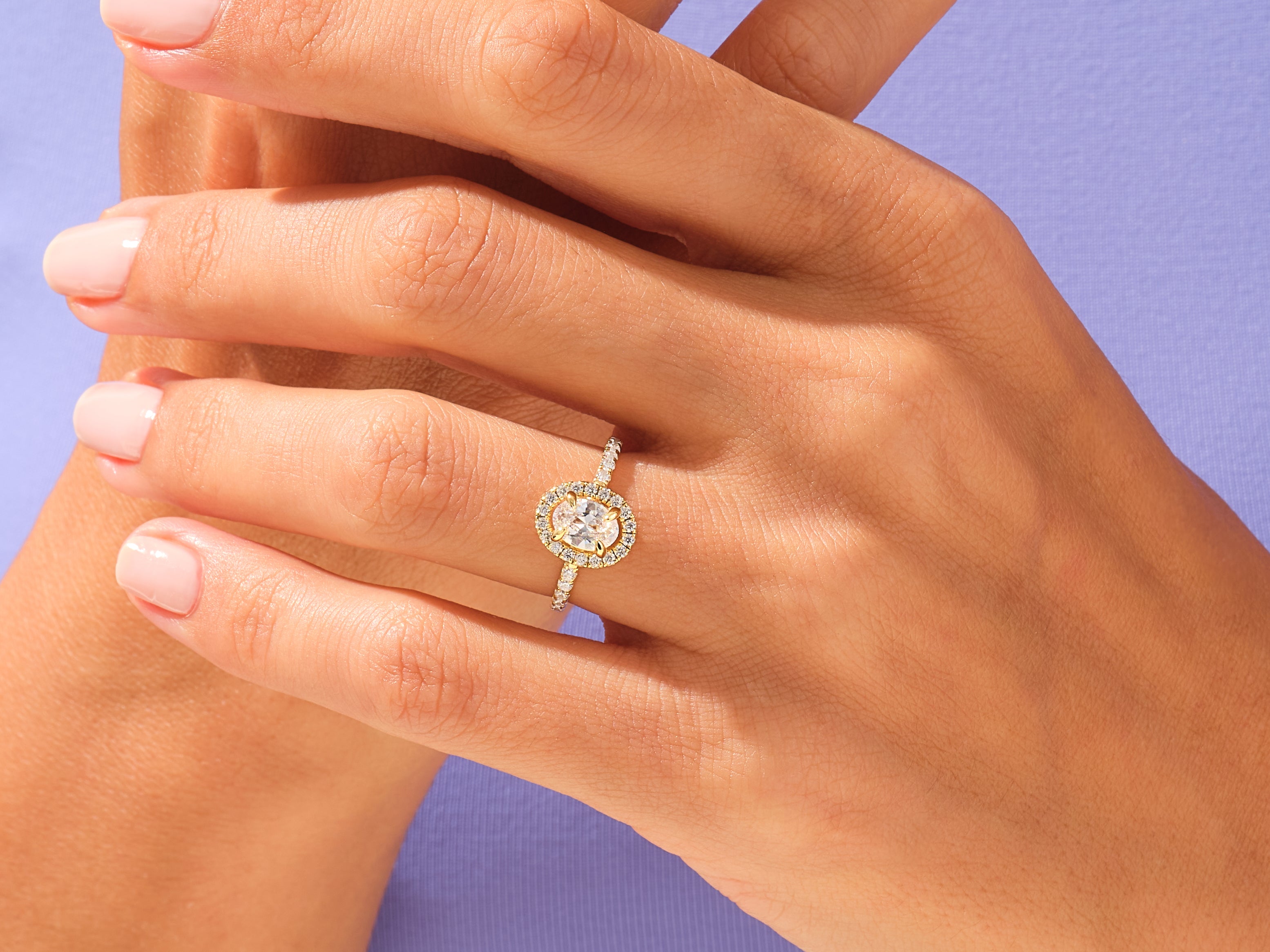 Oval Halo Engagement Ring with Pave Set Side Stones