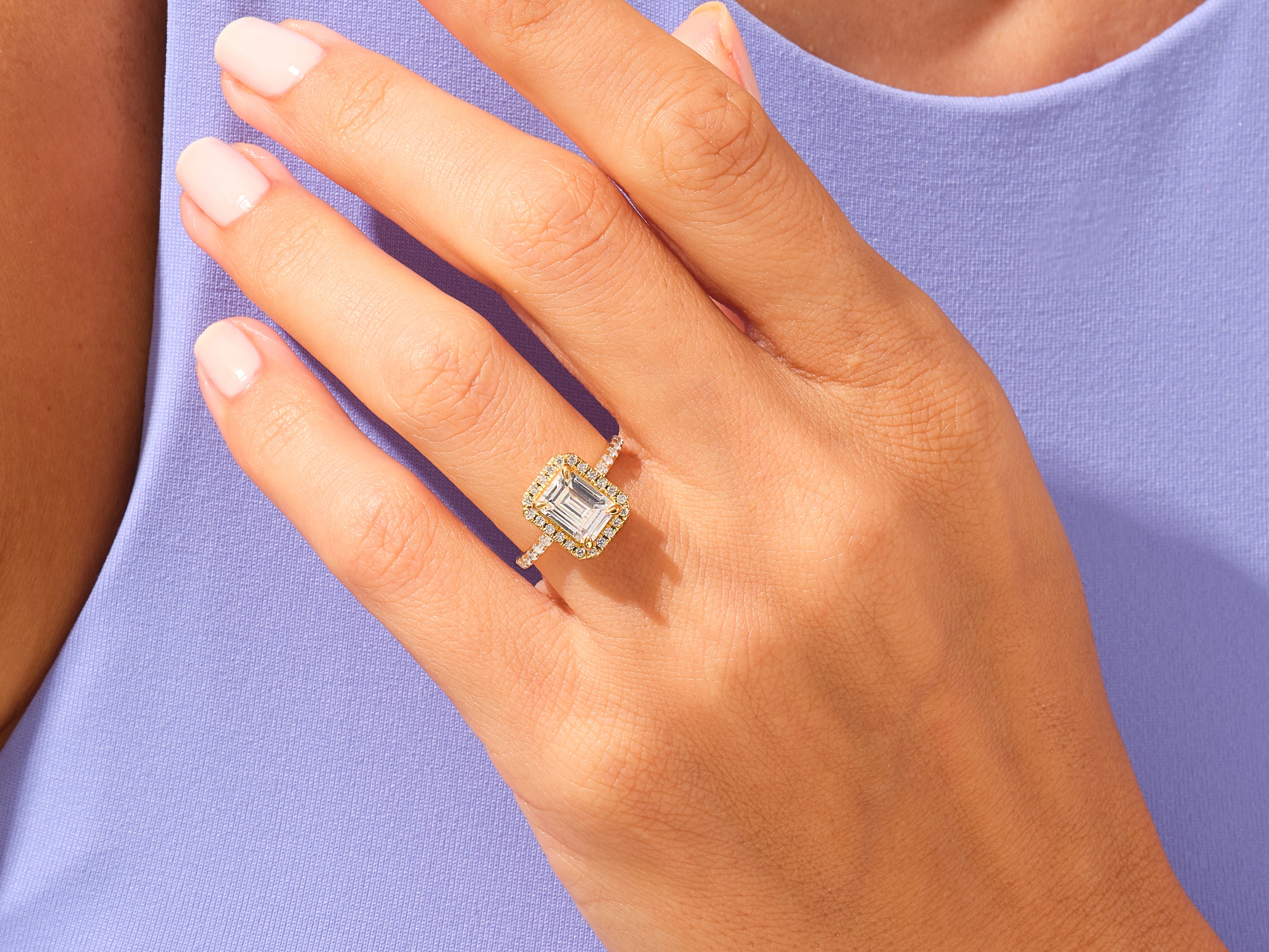 Emerald Halo Engagement Ring with Pave Set Side Stones