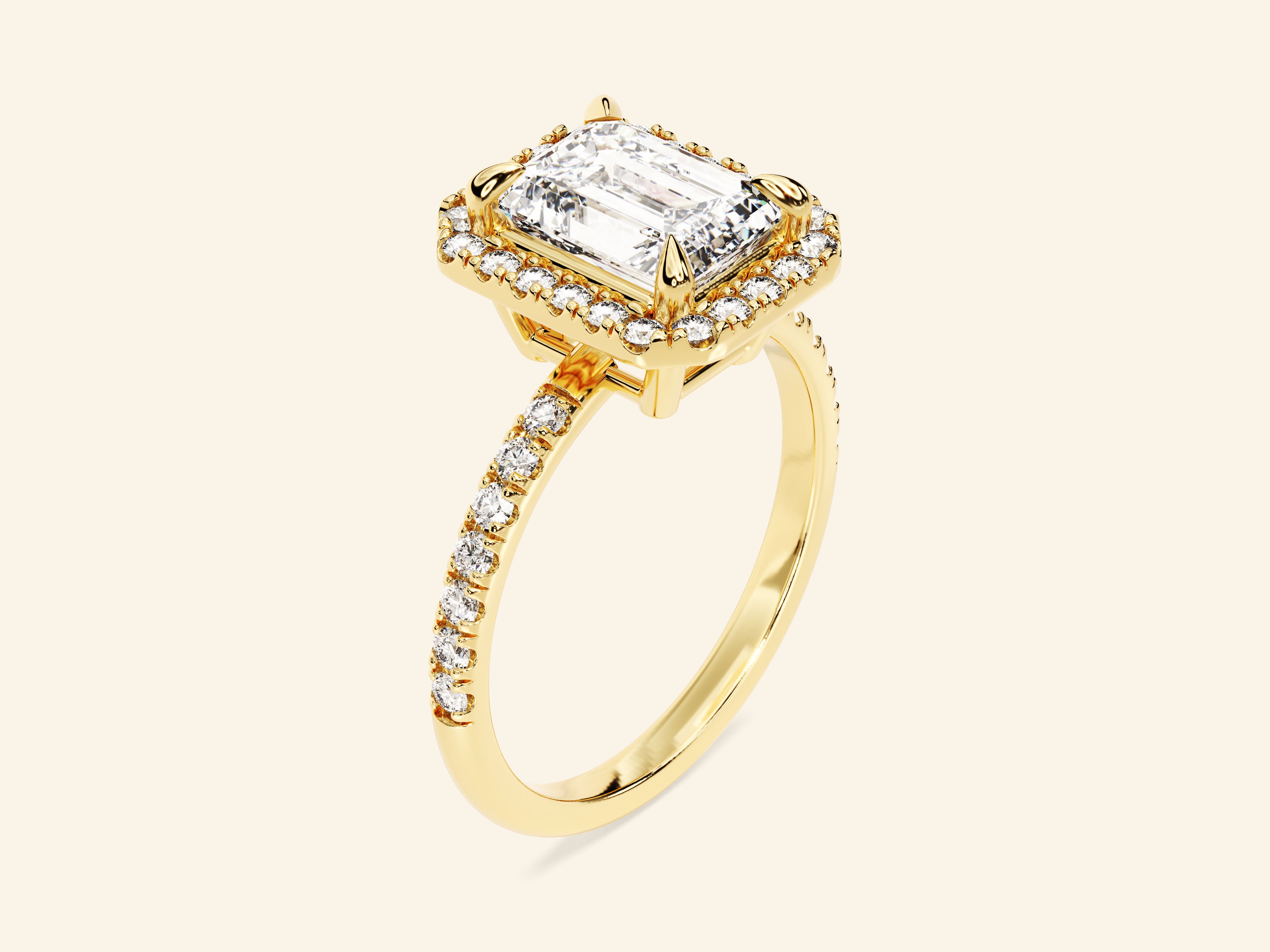 Emerald Halo Engagement Ring with Pave Set Side Stones