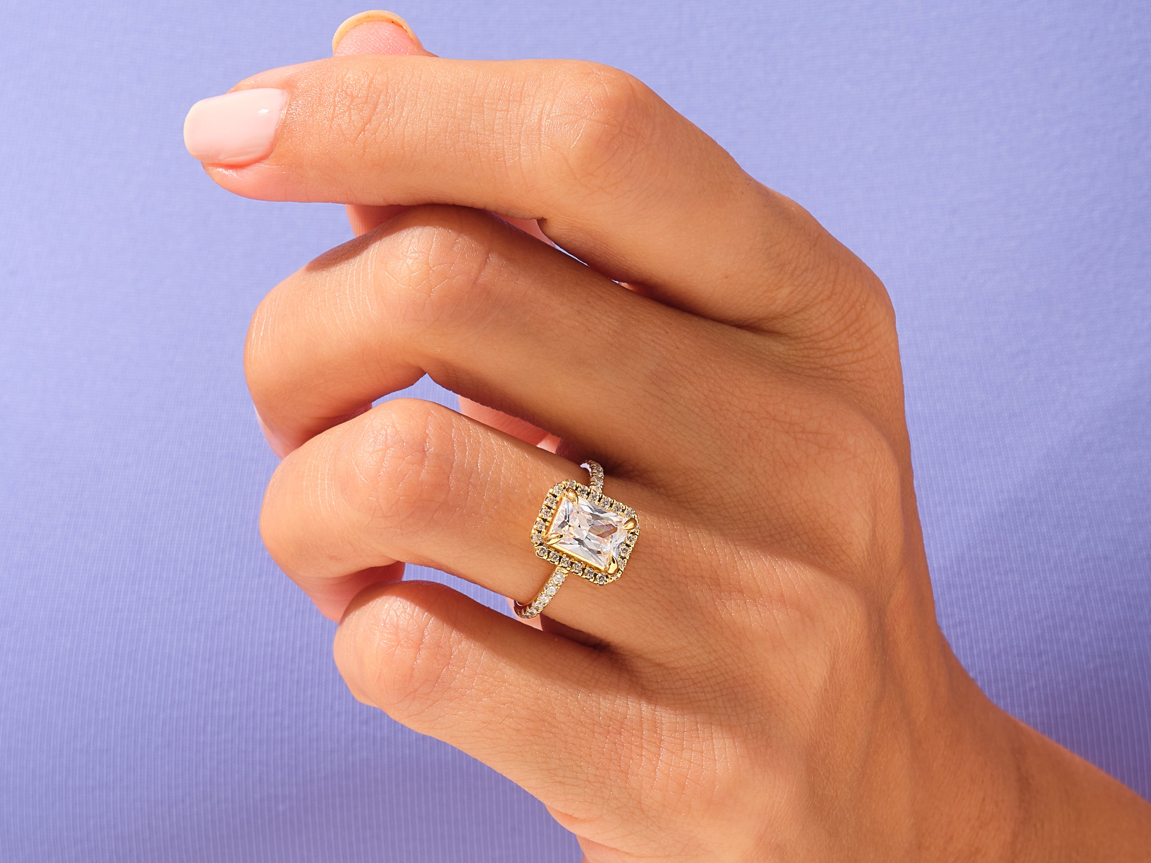 Radiant Halo Engagement Ring with Pave Set Side Stones