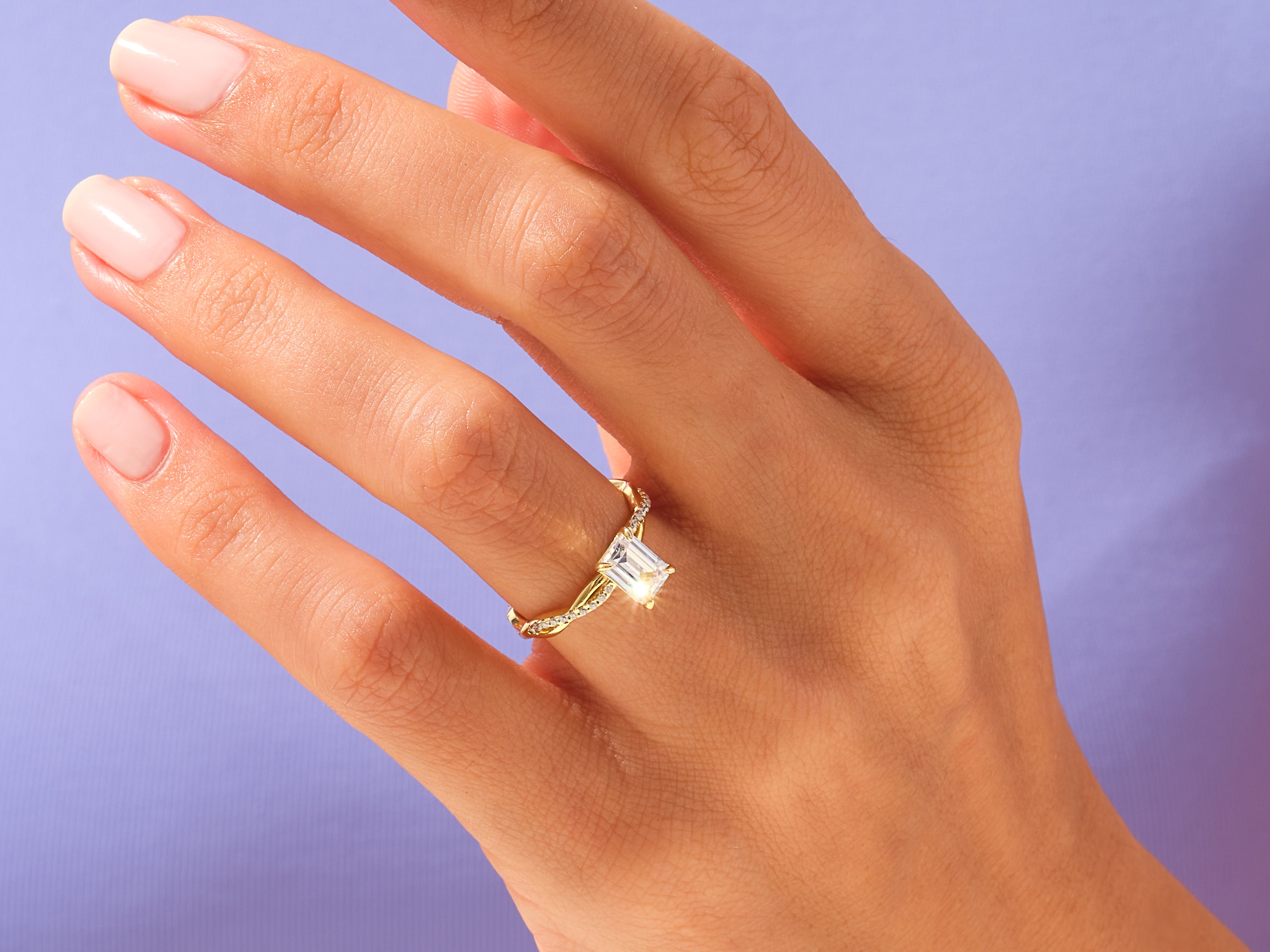 Emerald Twisted Engagement Ring