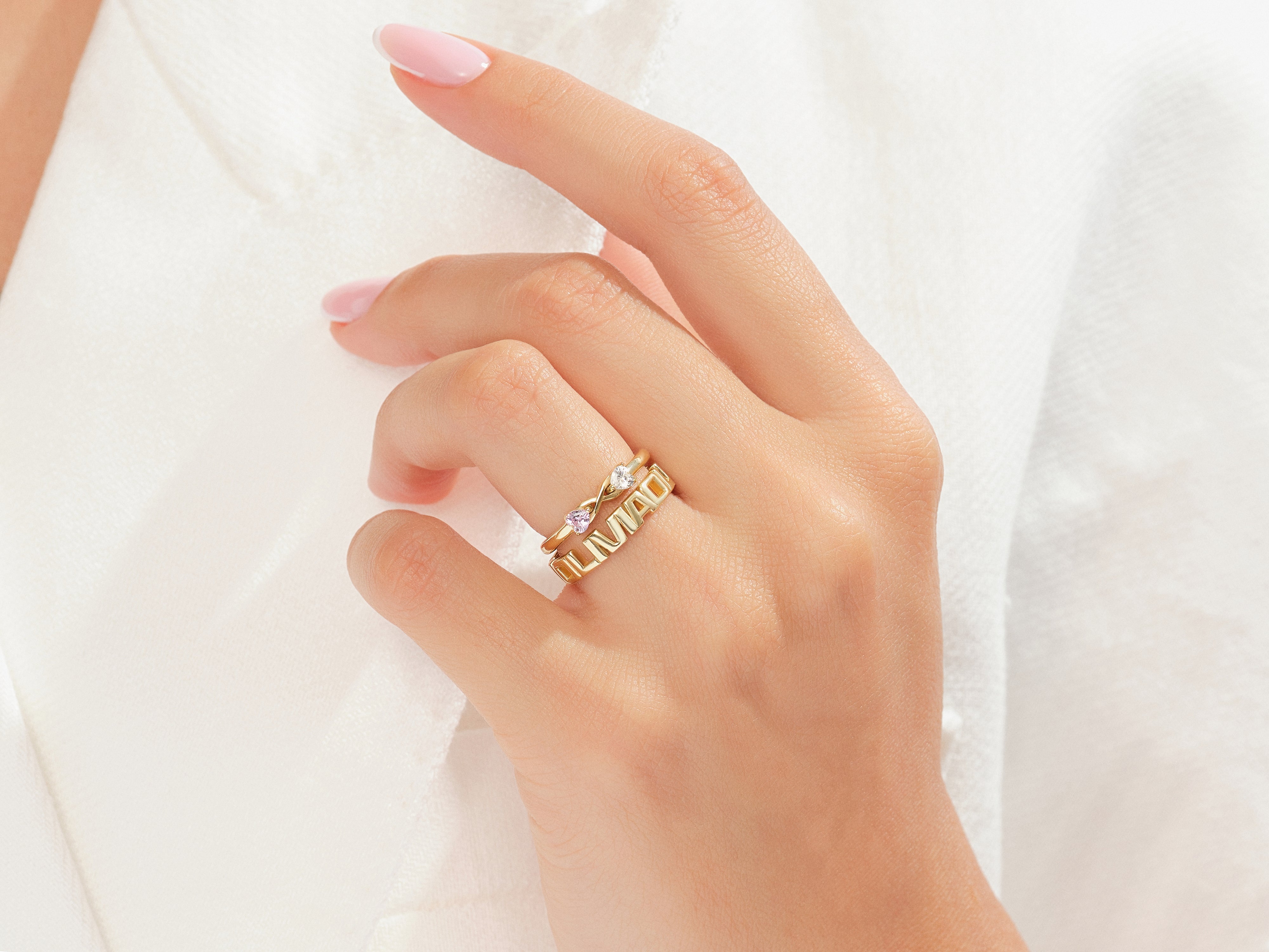 EG250_Model_Wearing_Infinity_Gemstone_Promis_Ring