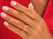 Rose gold band ring on hand, jewelry product photography