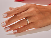 Elegant silver ring on a manicured hand, jewelry photography