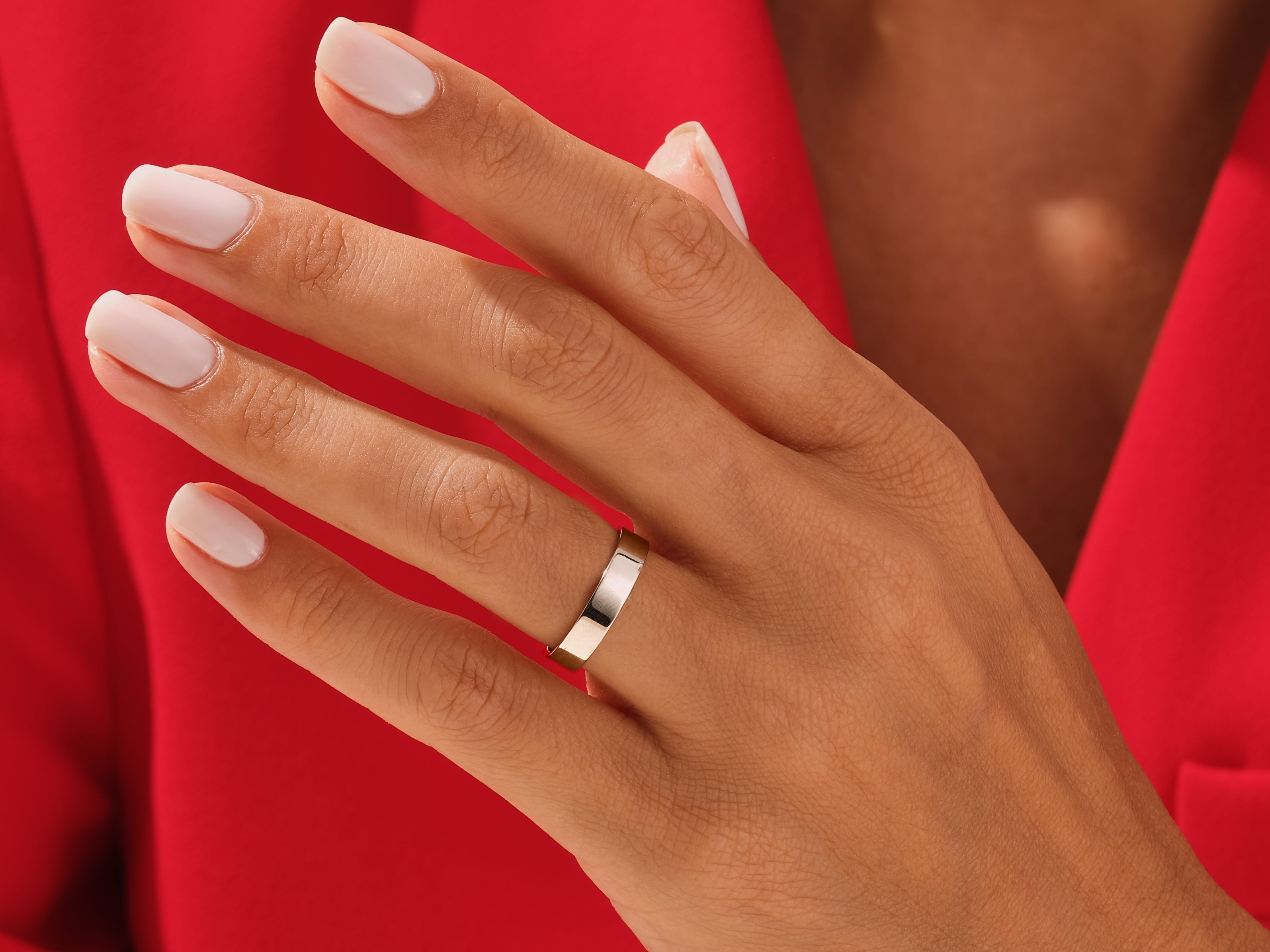 Elegant gold ring on a hand, jewelry for her