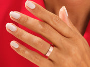 Rose gold ring on a hand, jewelry product photography