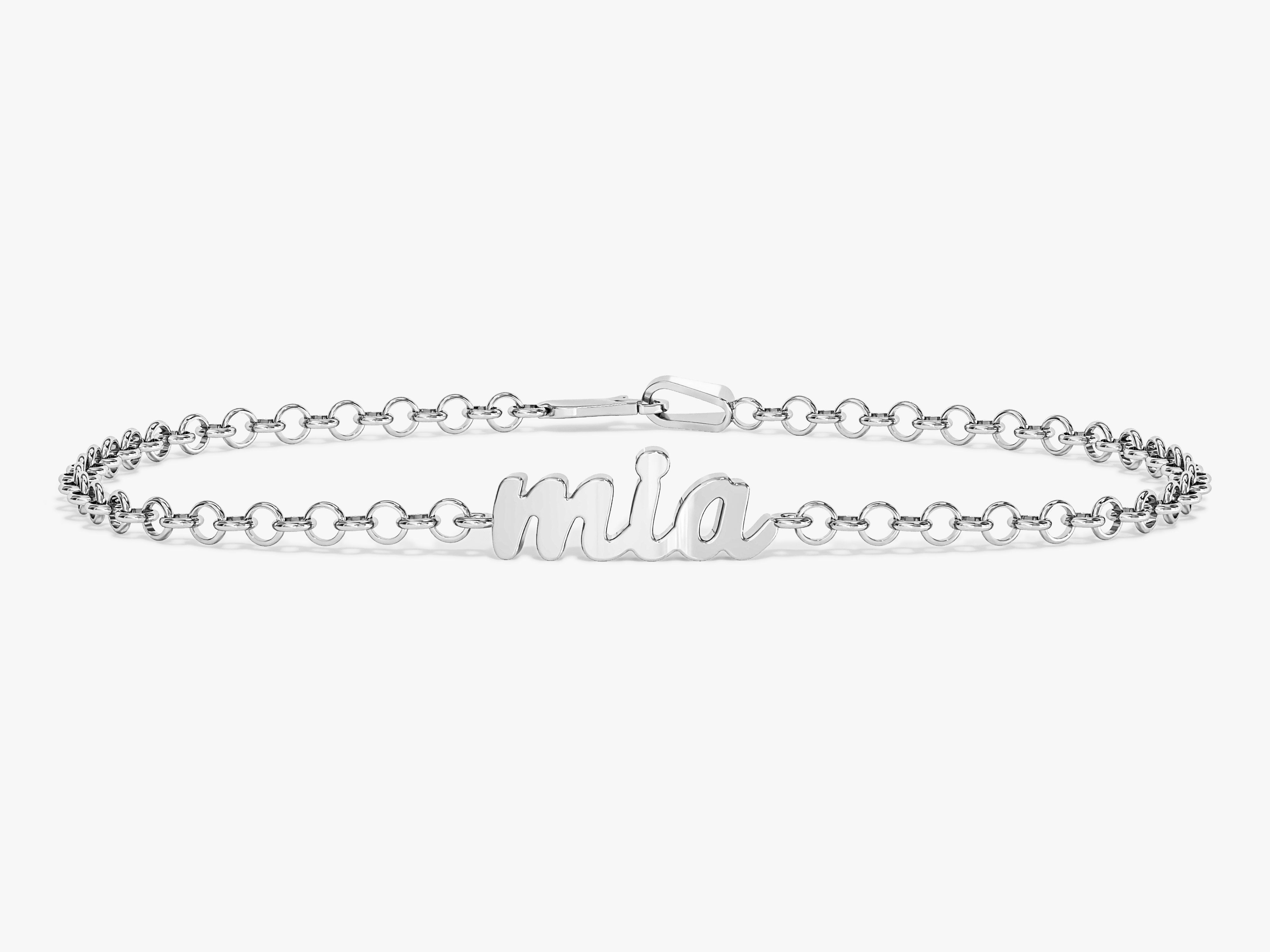 Silver name bracelet with "mia" script for jewelry company