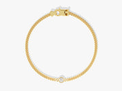 Gold curb chain bracelet with diamond accent from jewelry firm