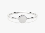 Minimalist silver ring with a smooth oval face, jewelry