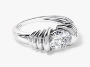 Diamond engagement ring with unique twisted band from jewelry firm
