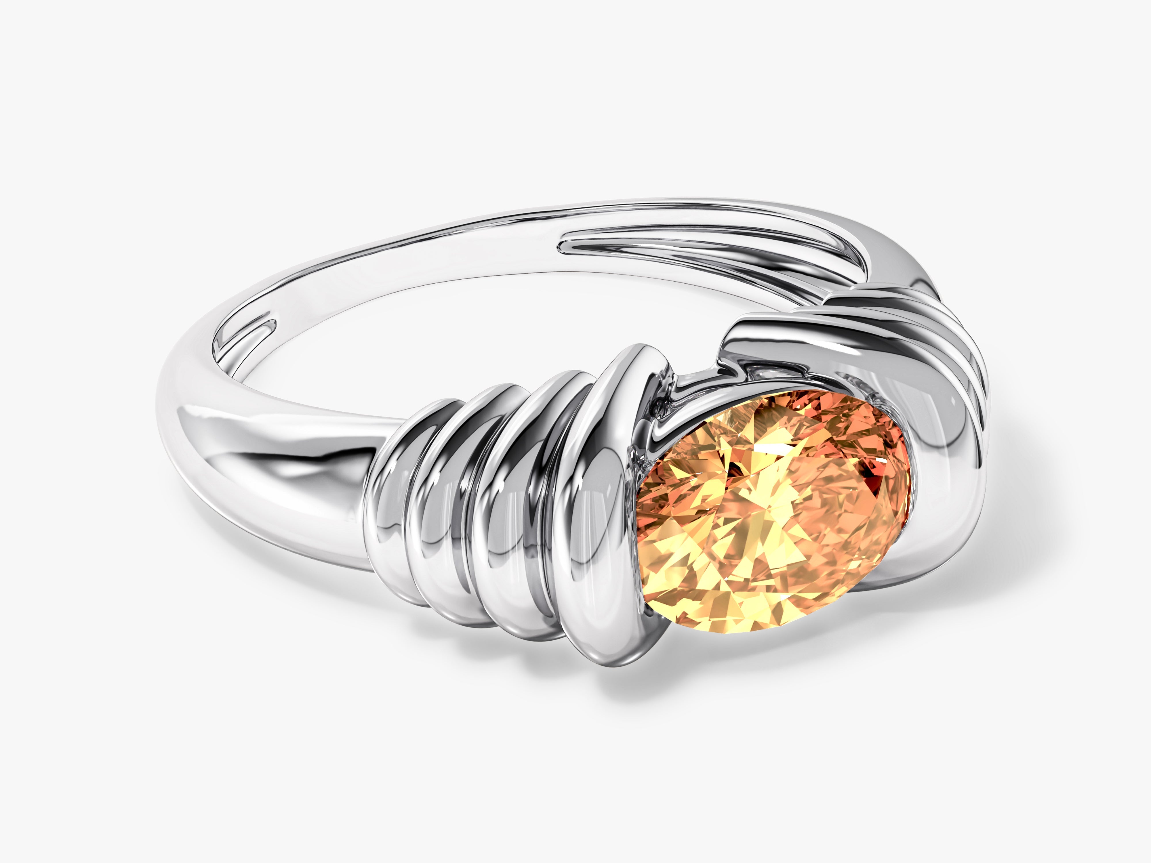 Silver ring with oval orange gemstone, jewelry design