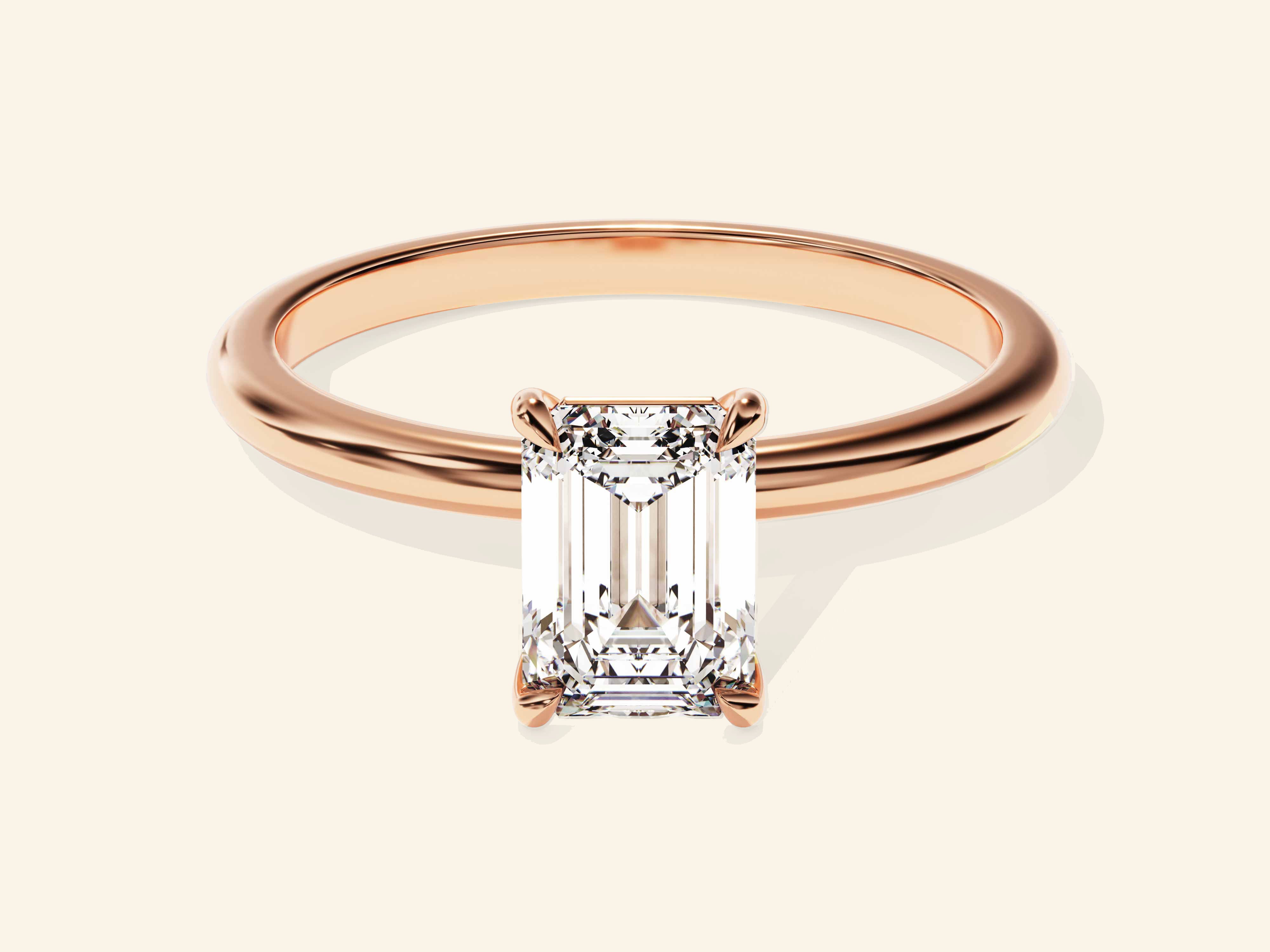 Emerald Solitaire Engagement Ring