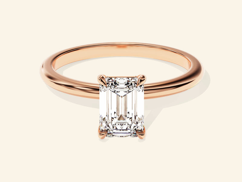 Emerald Solitaire Engagement Ring