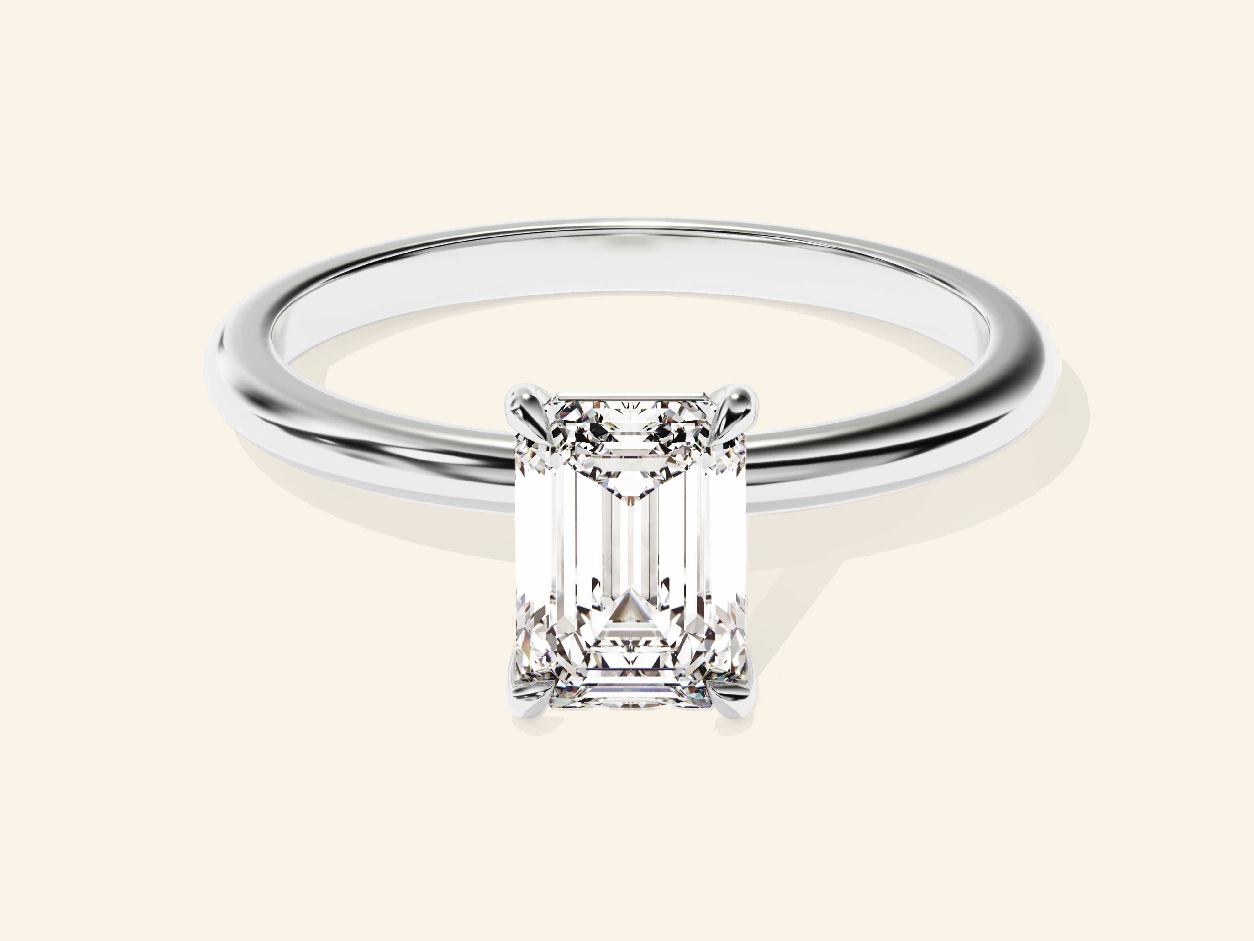 Emerald Solitaire Engagement Ring