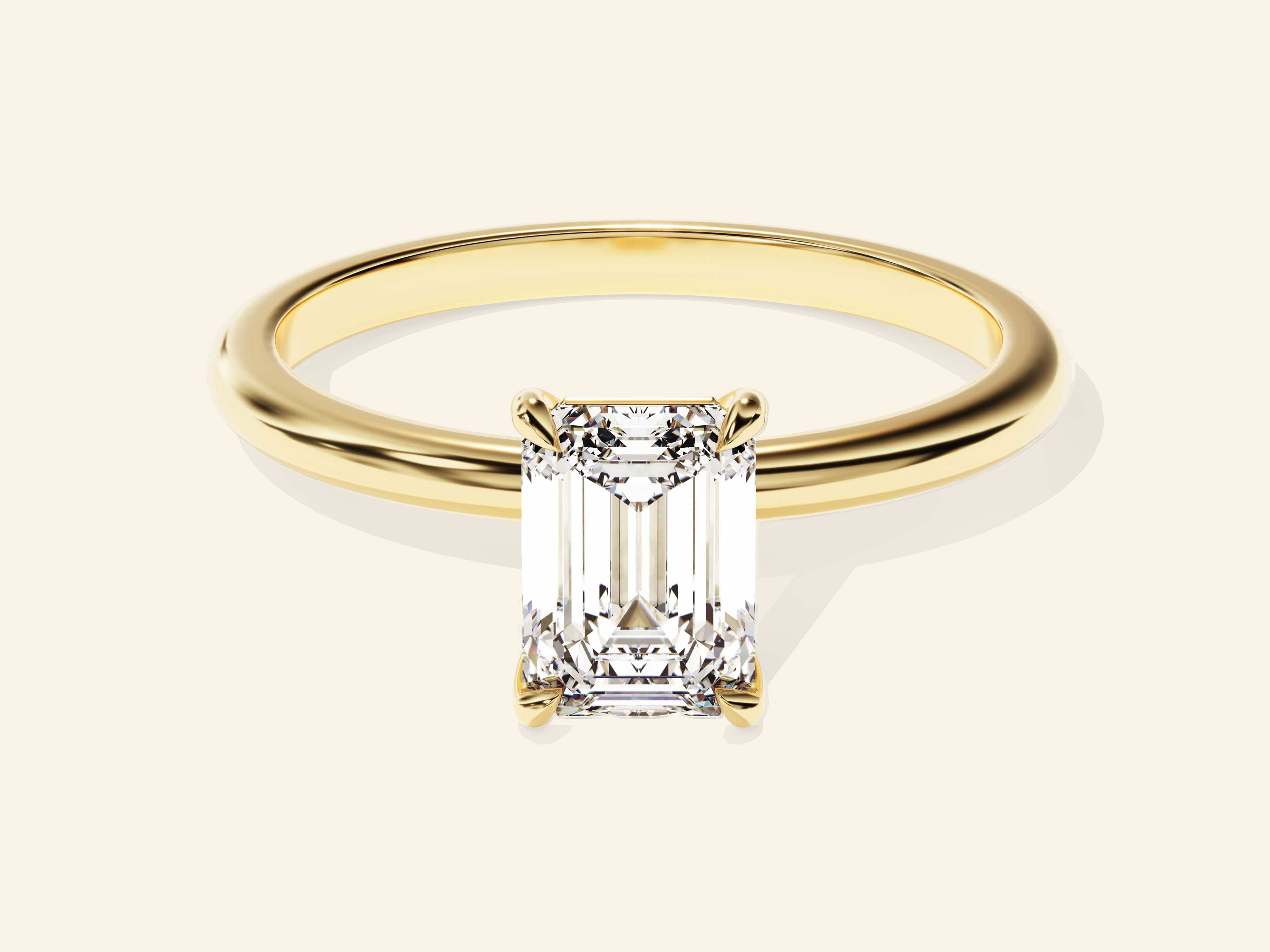 Emerald Solitaire Engagement Ring