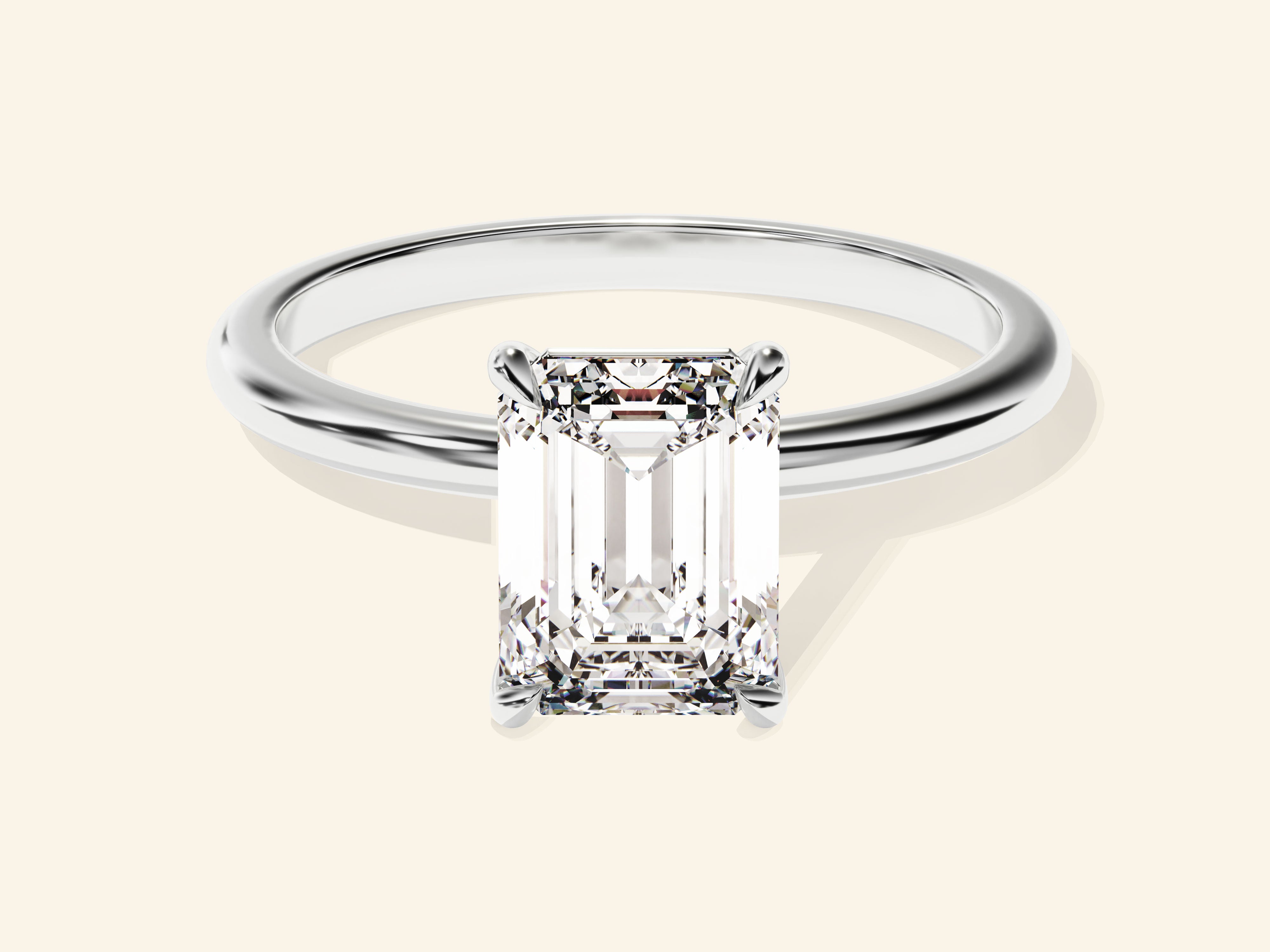 Emerald Solitaire Engagement Ring