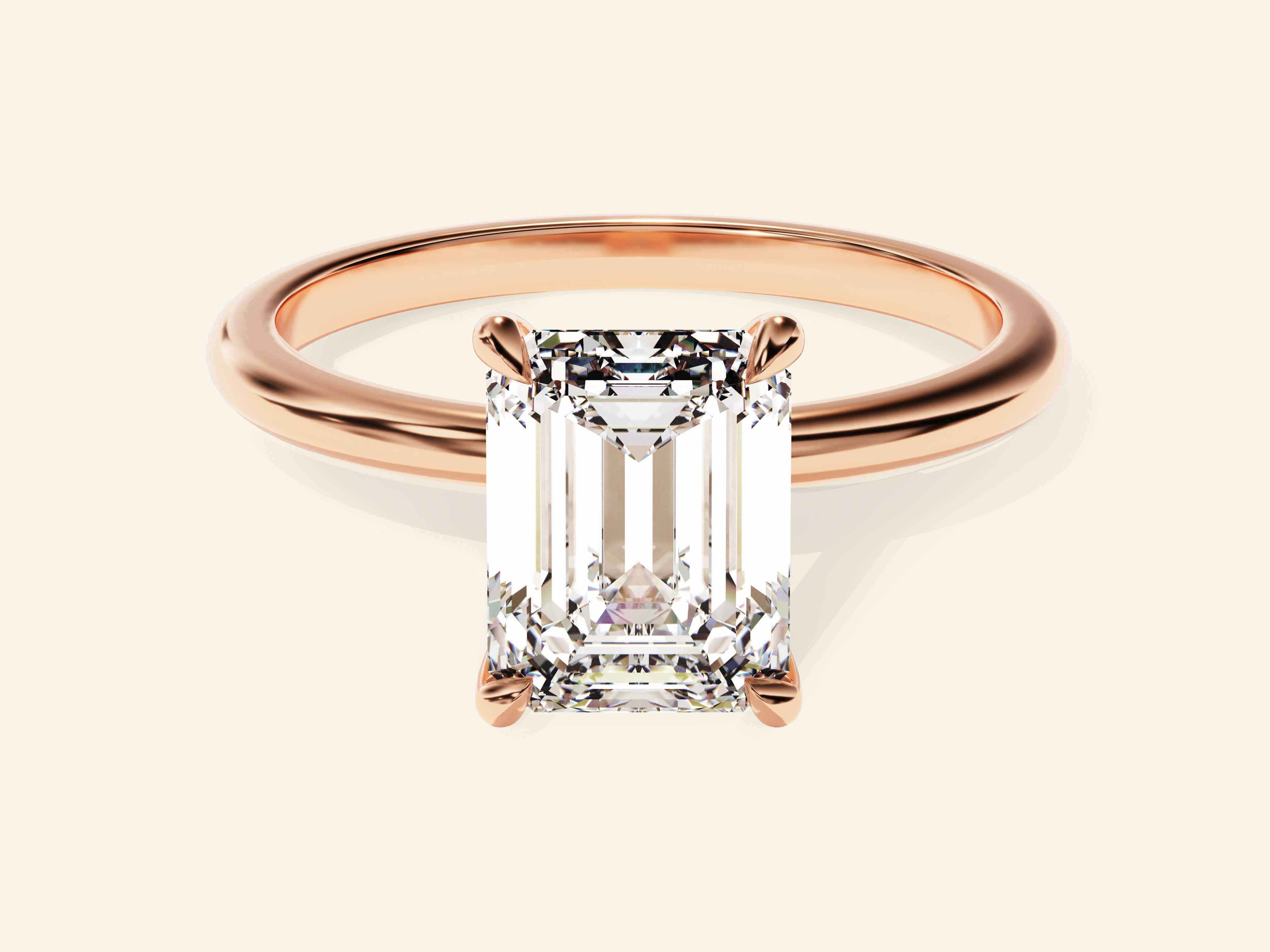 Emerald Solitaire Engagement Ring