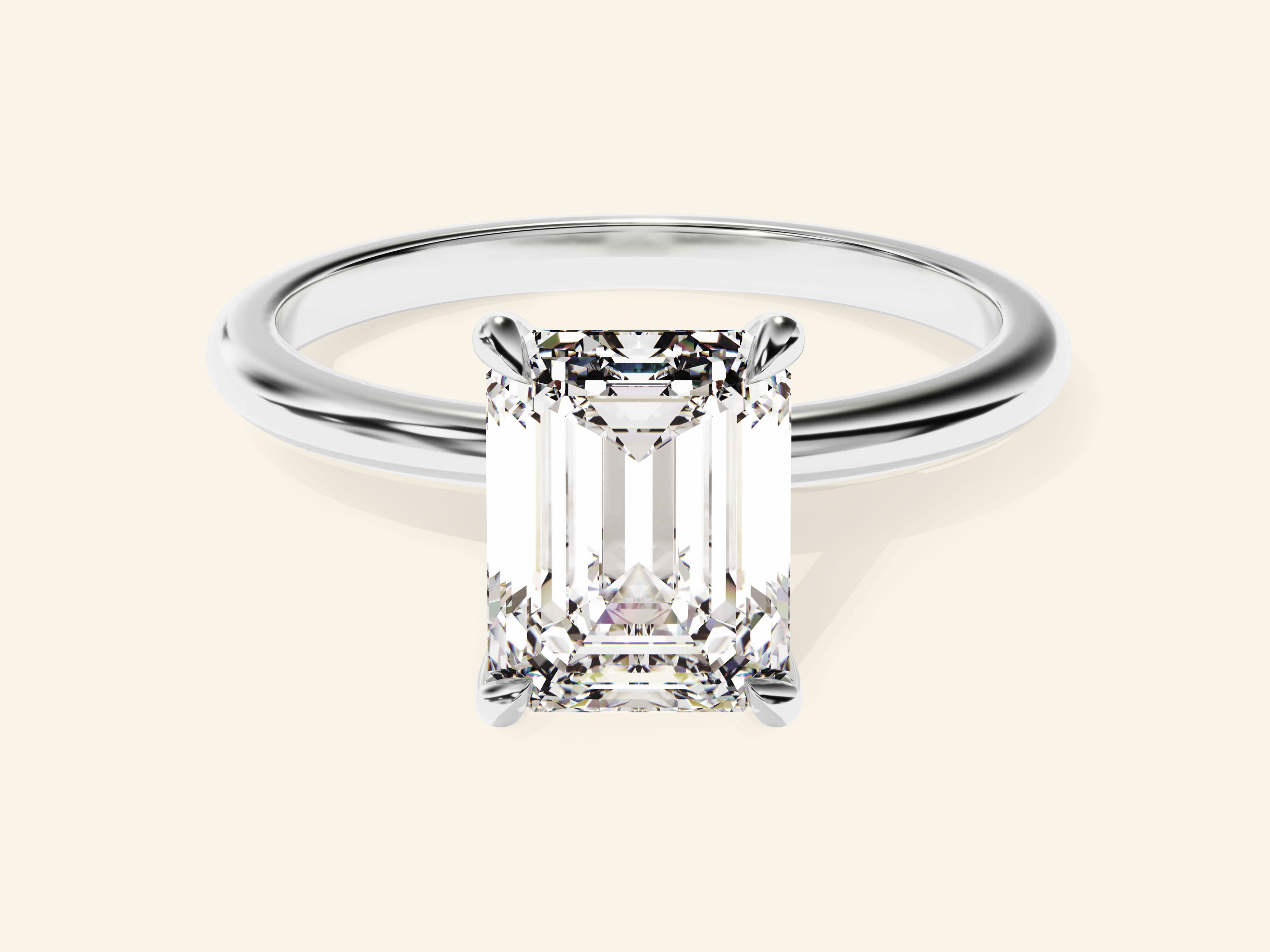 Emerald Solitaire Engagement Ring