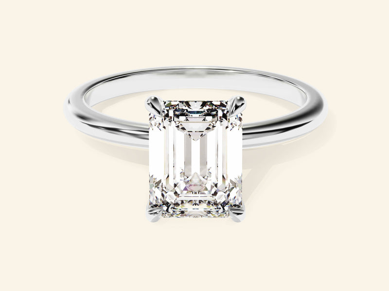 Emerald Solitaire Engagement Ring
