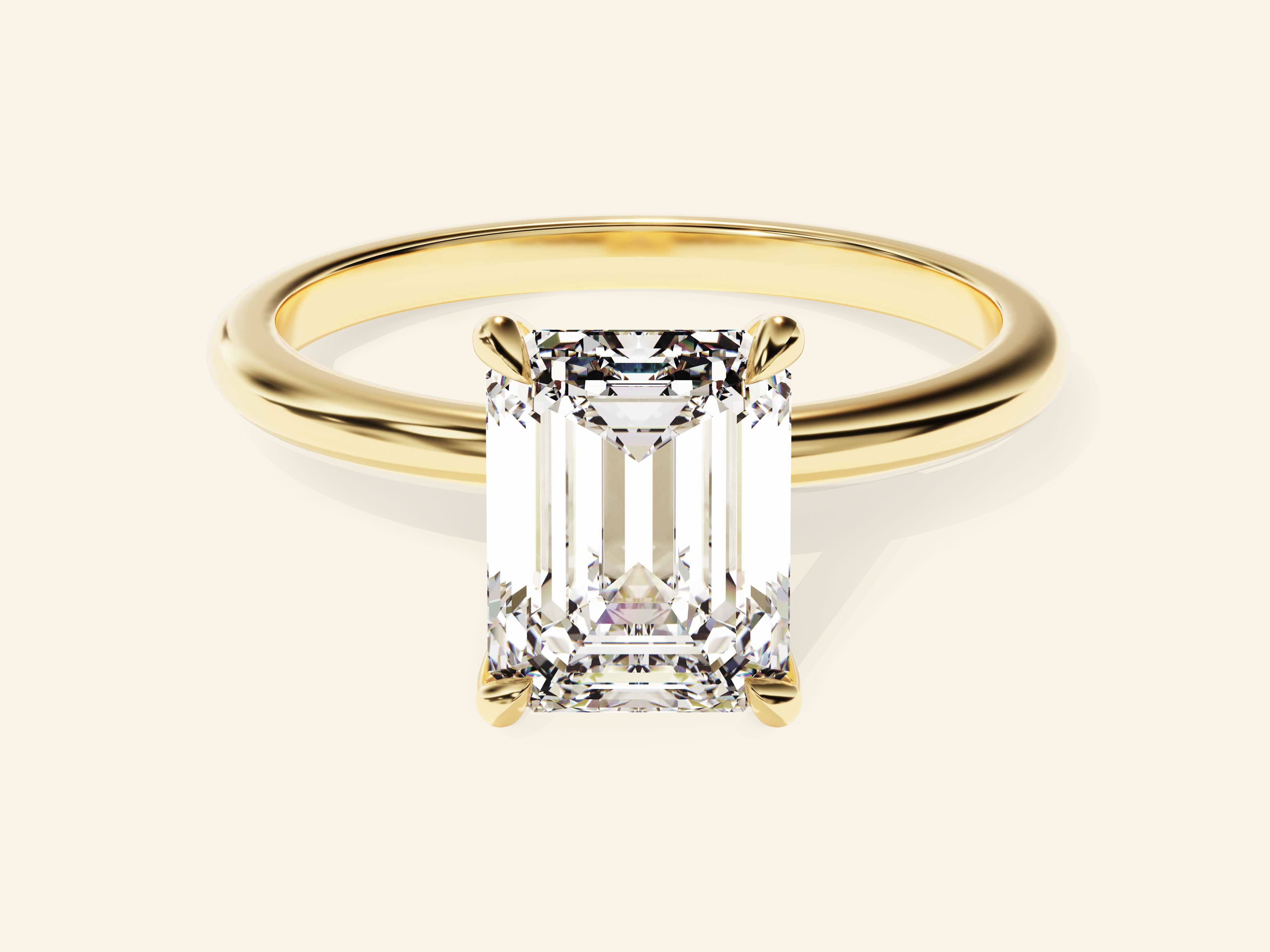 Emerald Solitaire Engagement Ring