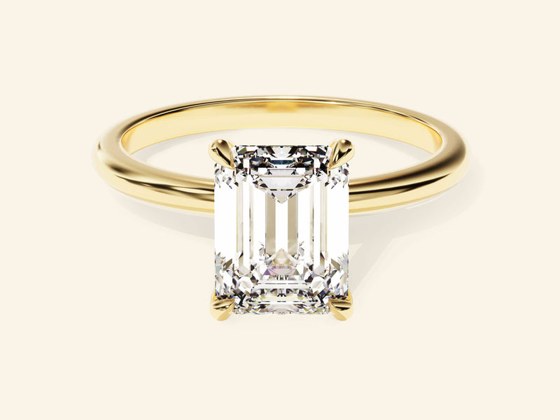 Emerald Solitaire Engagement Ring