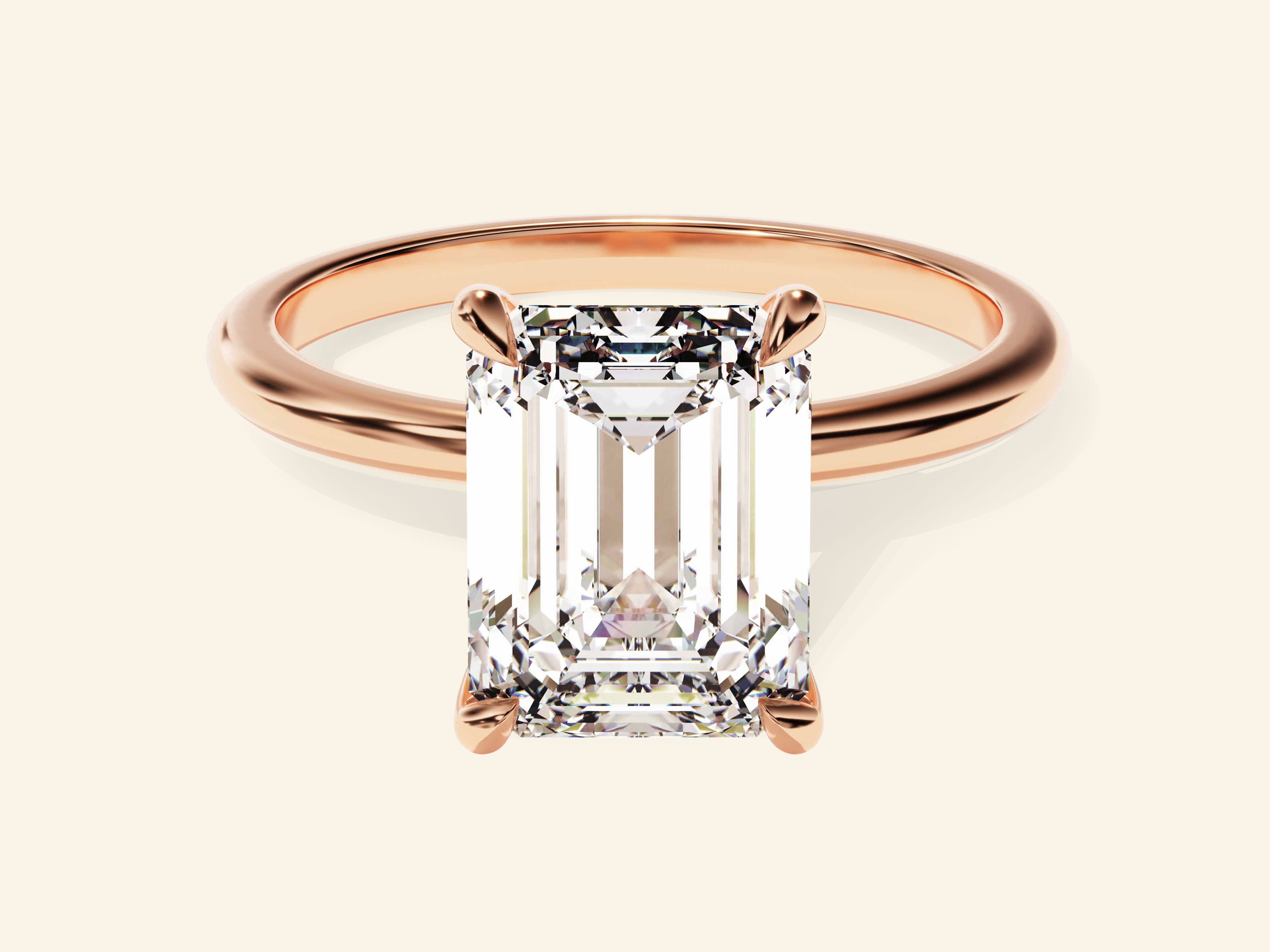 Emerald Solitaire Engagement Ring