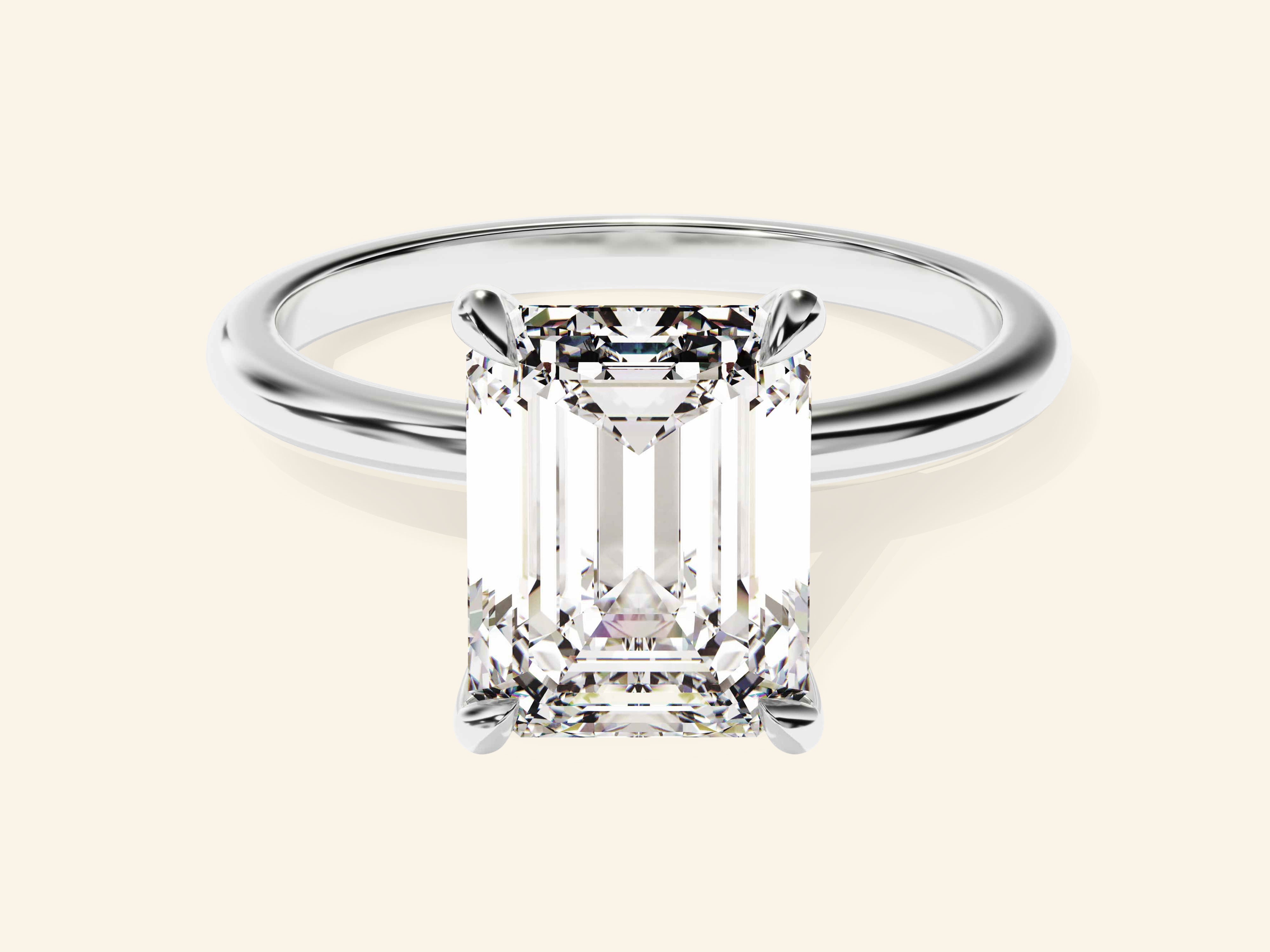 Emerald Solitaire Engagement Ring