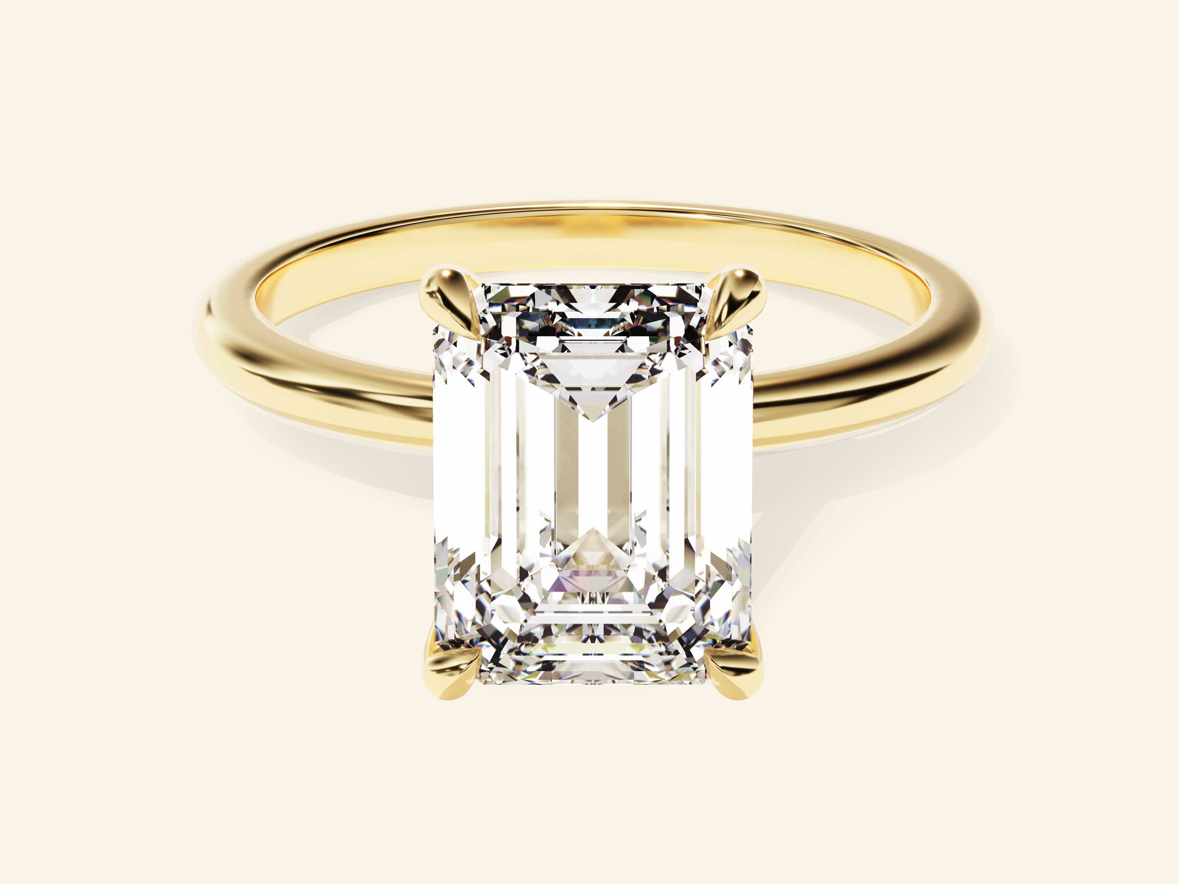 Emerald Solitaire Engagement Ring
