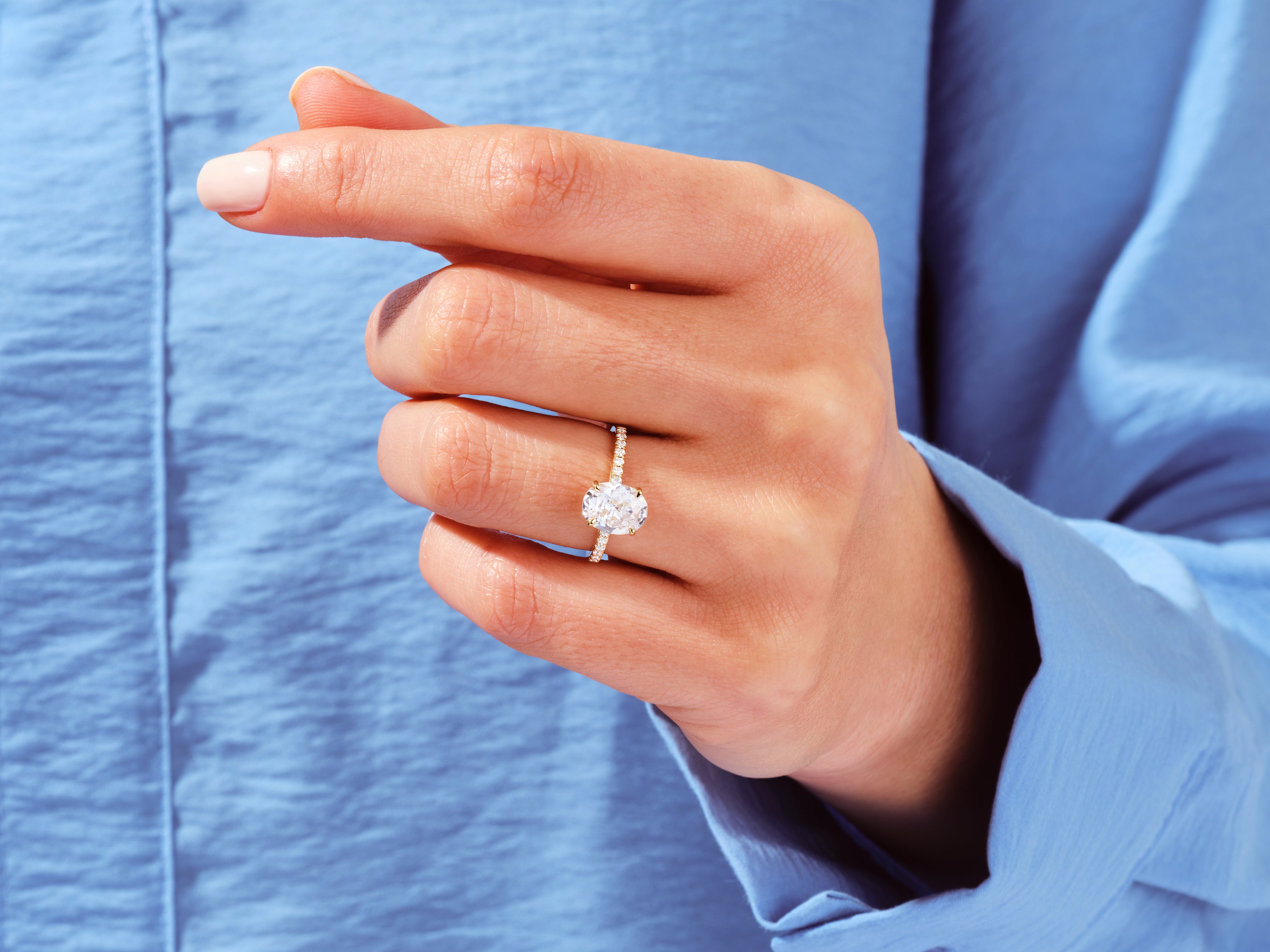 Oval Cut Engagement Ring with Pave Set Side Stones