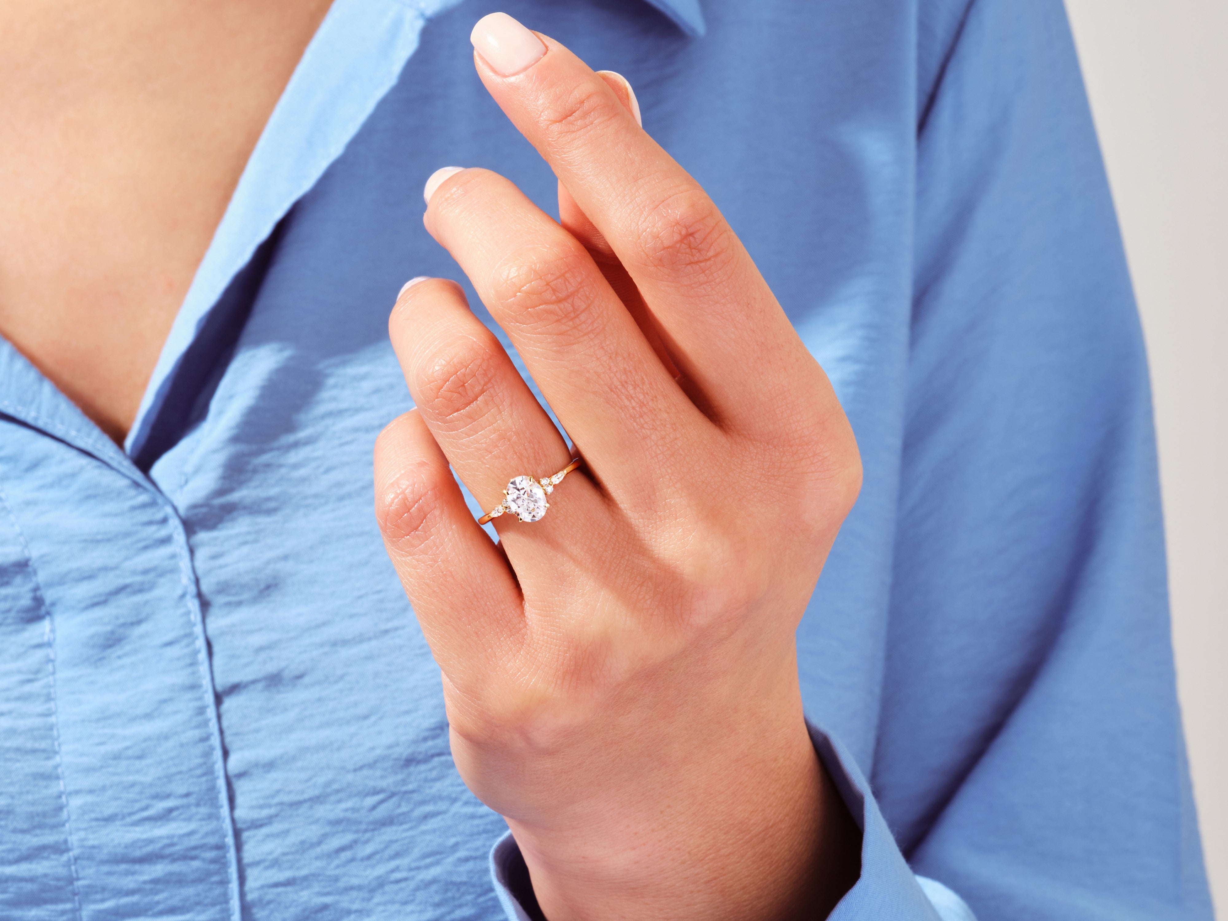 Cluster Accent Oval Cut Engagement Ring
