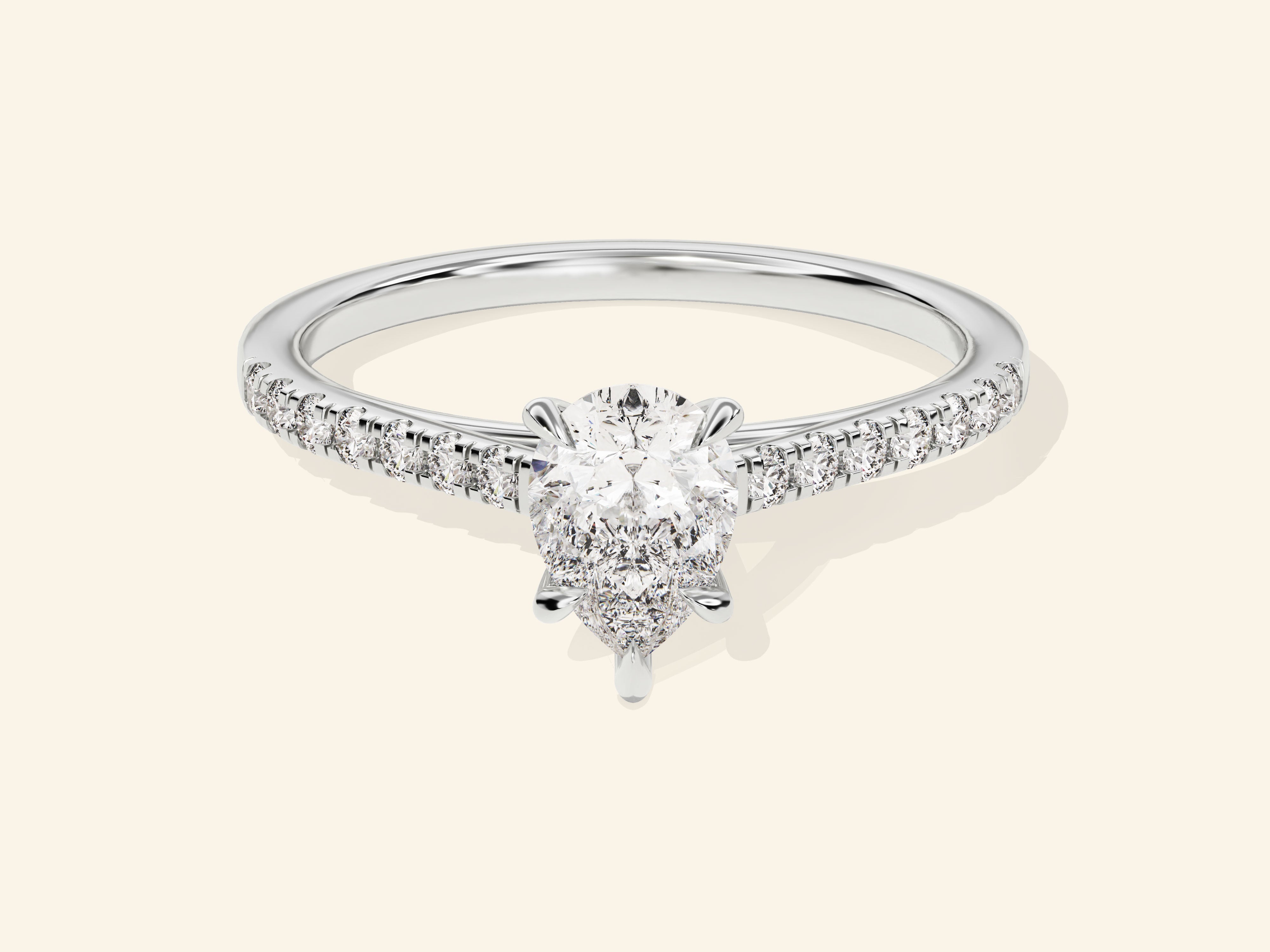 Pear Cut Engagement Ring with Pave Set Side Stones