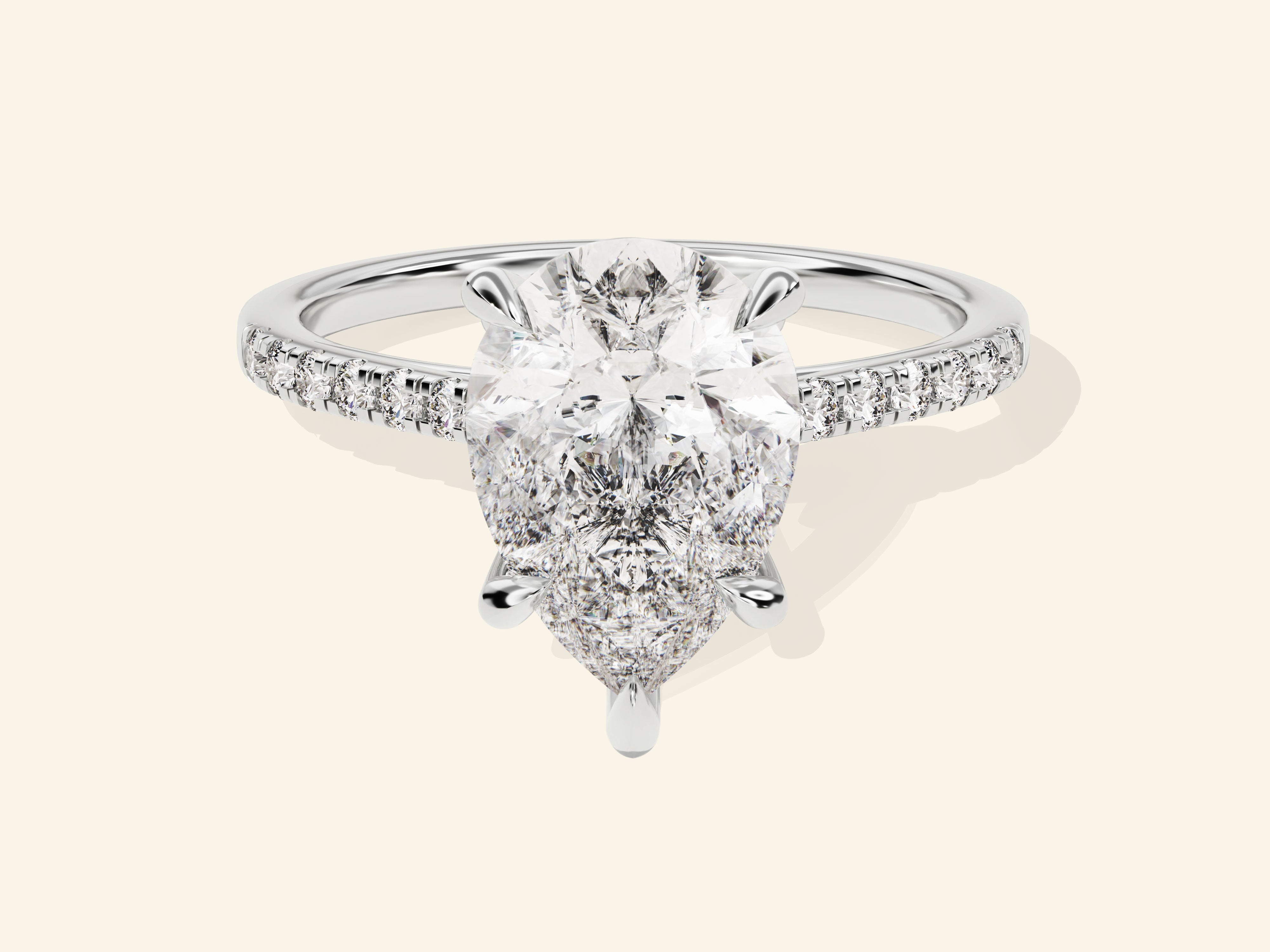 Pear Cut Engagement Ring with Pave Set Side Stones