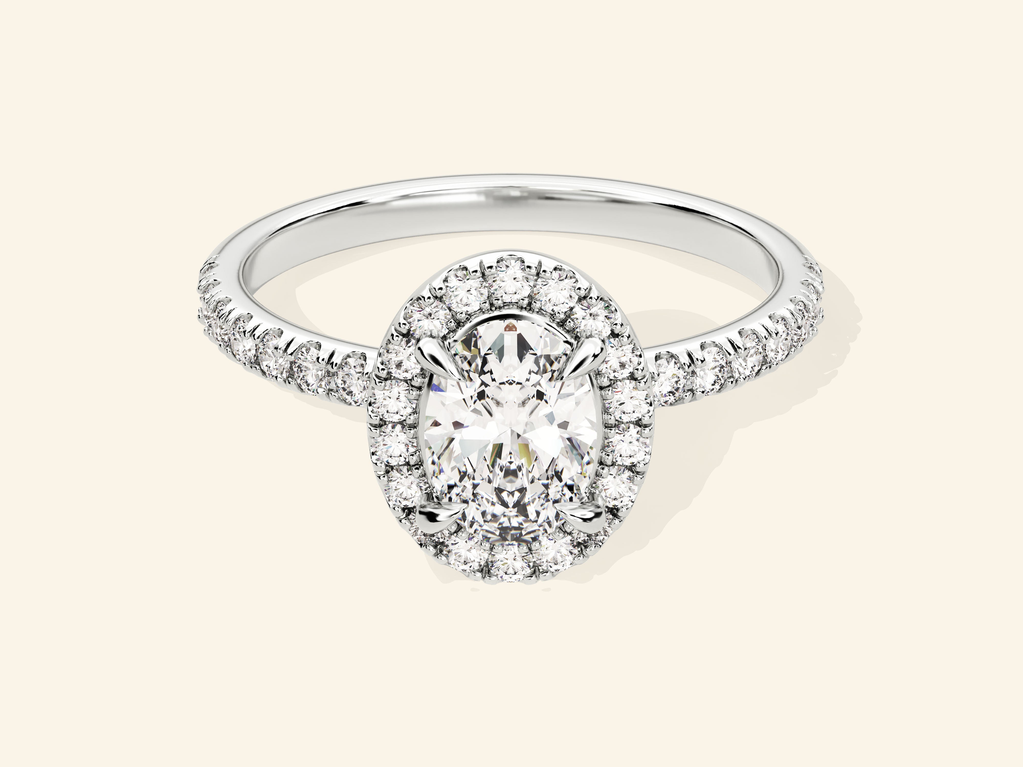 Oval Halo Engagement Ring with Pave Set Side Stones
