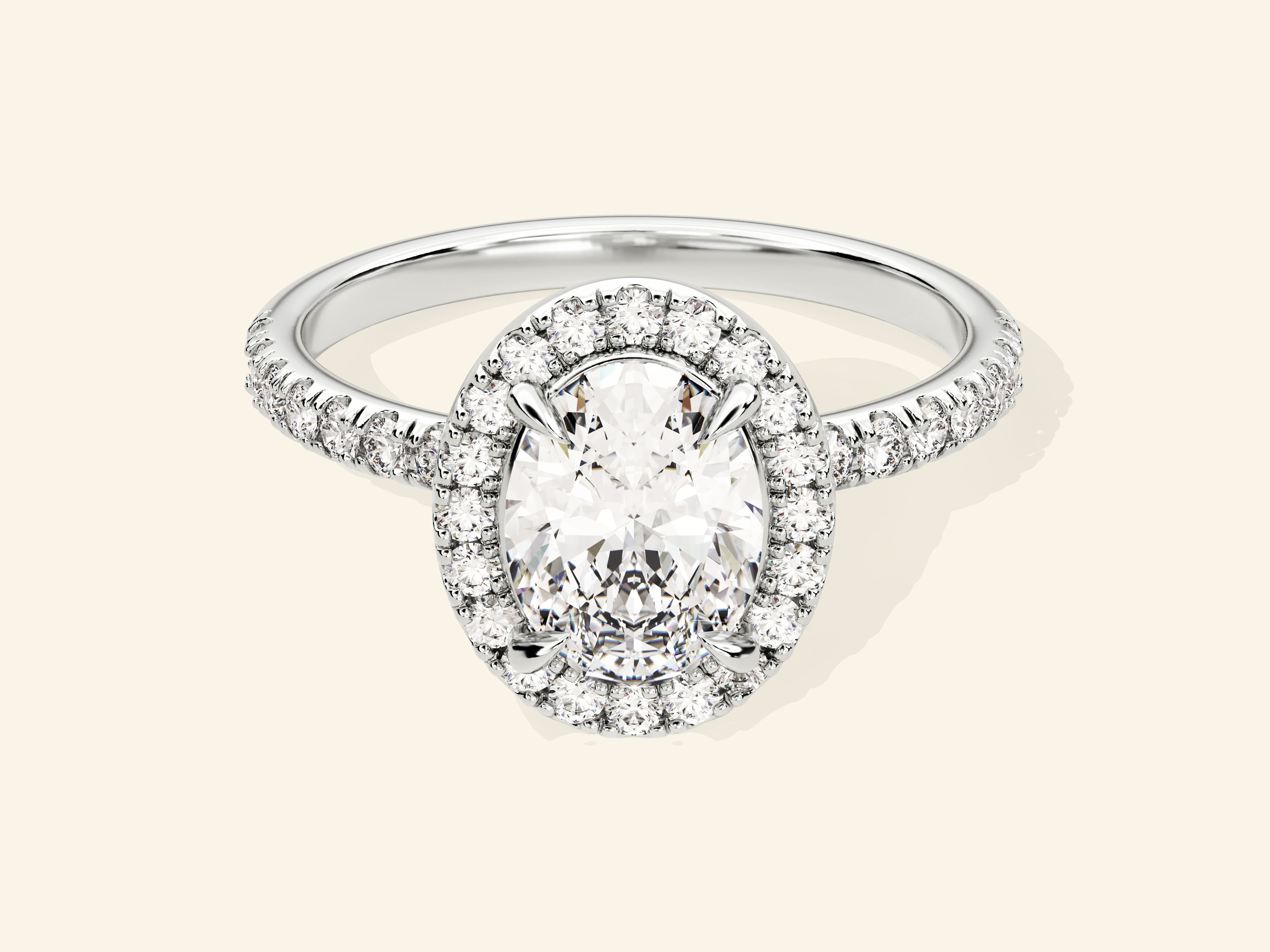 Oval Halo Engagement Ring with Pave Set Side Stones