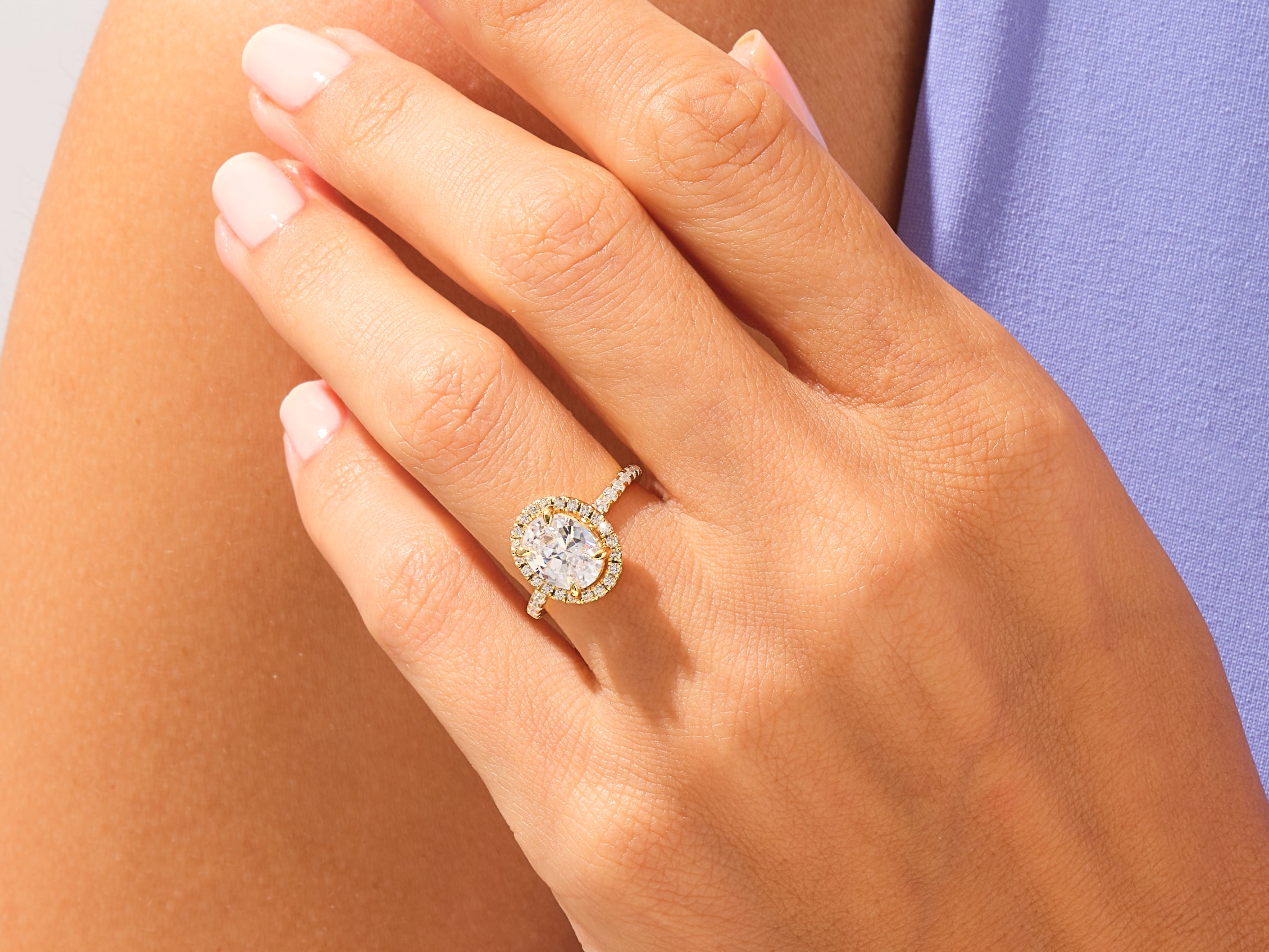 Oval Halo Engagement Ring with Pave Set Side Stones