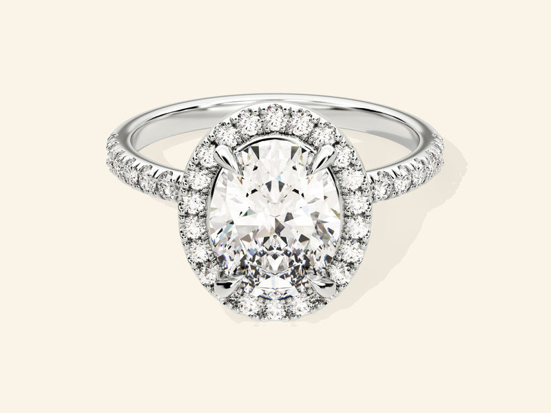 Oval Halo Engagement Ring with Pave Set Side Stones