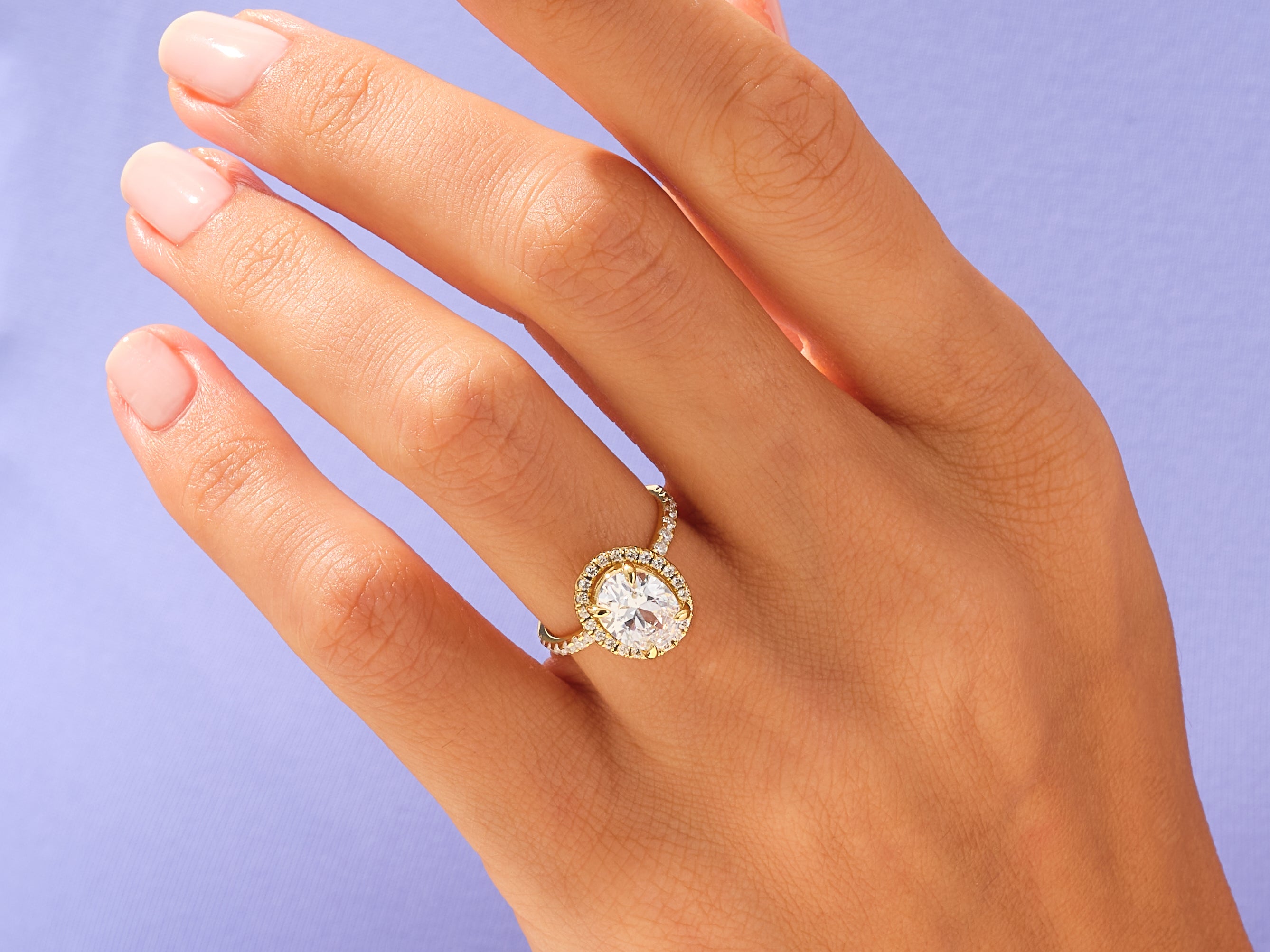 Oval Halo Engagement Ring with Pave Set Side Stones
